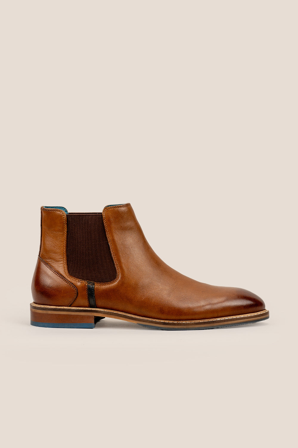 Jack Tan Chelsea boots for men made with premium leather, lambskin lining, and a handmade sole—offering comfort, craftsmanship, and timeless sophistication.