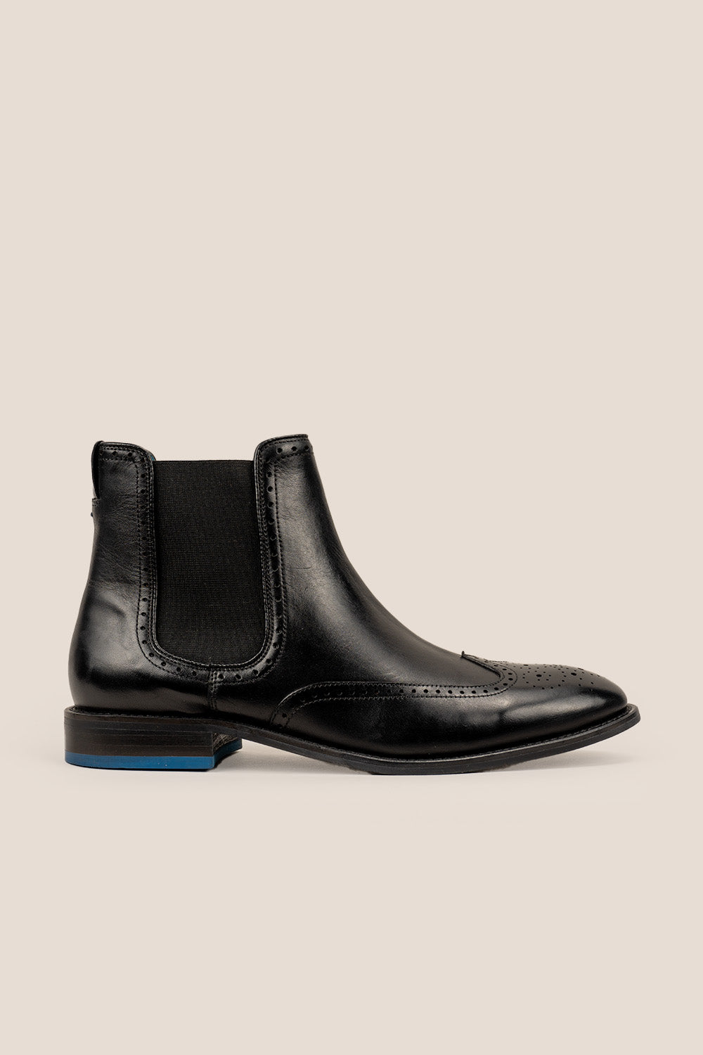 Harry Black Chelsea brogue leather boots for men featuring premium leather, lambskin lining, handmade sole, blending classic luxury with modern comfort.