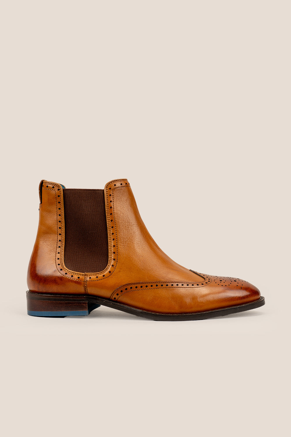 Harry Tan Chelsea brogue boots for men made from premium leather with lambskin lining and handmade sole, combining classic style and modern comfort.