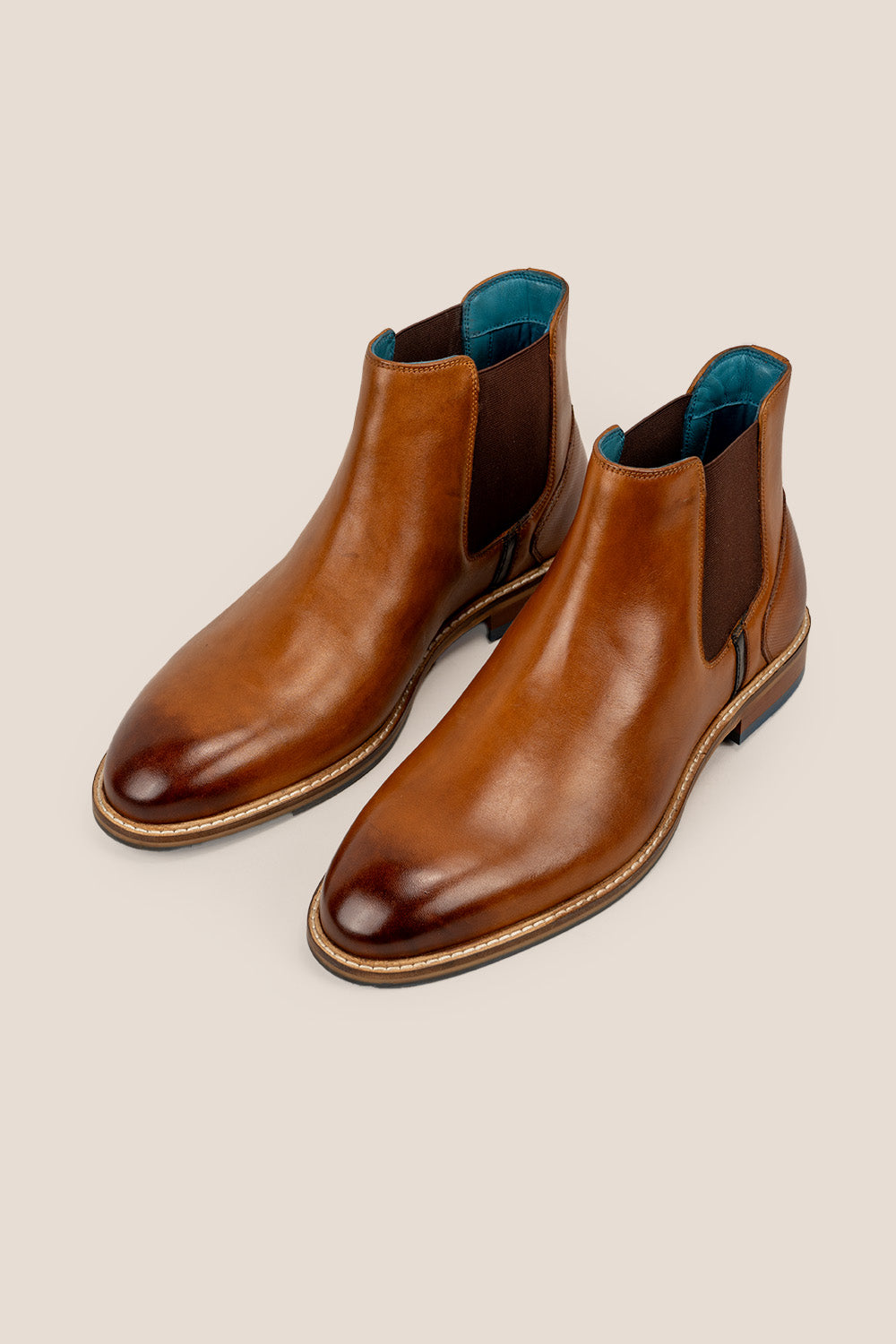 Jack Tan Chelsea boots for men made with premium leather, lambskin lining, and a handmade sole—offering comfort, craftsmanship, and timeless sophistication.