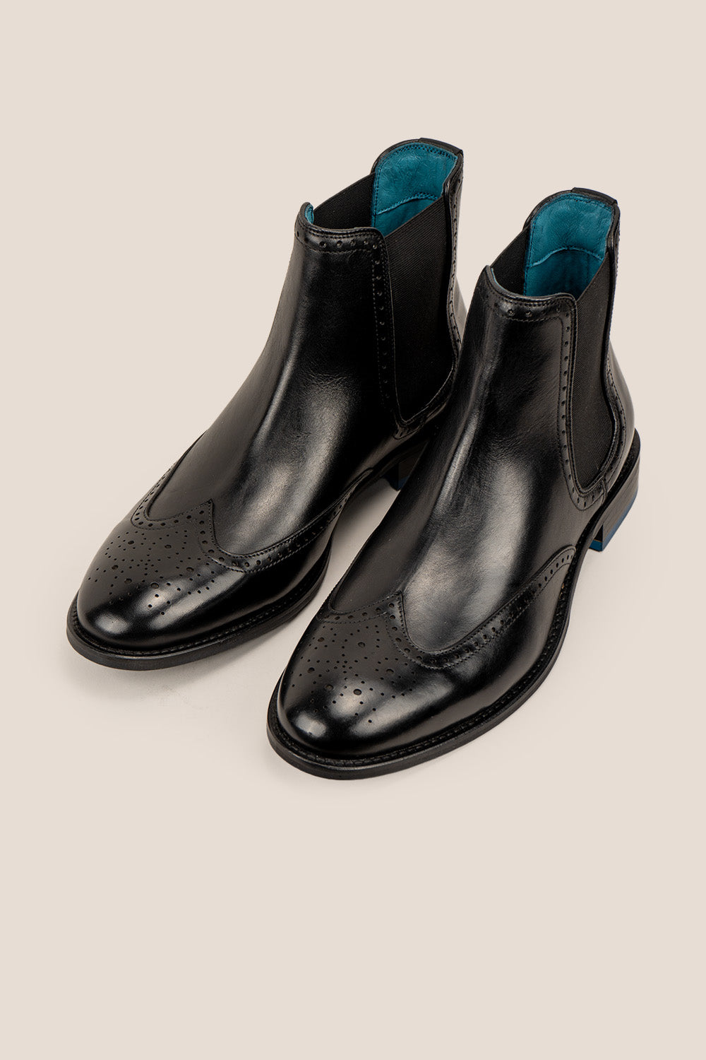 Harry Black Chelsea brogue leather boots for men featuring premium leather, lambskin lining, handmade sole, blending classic luxury with modern comfort.