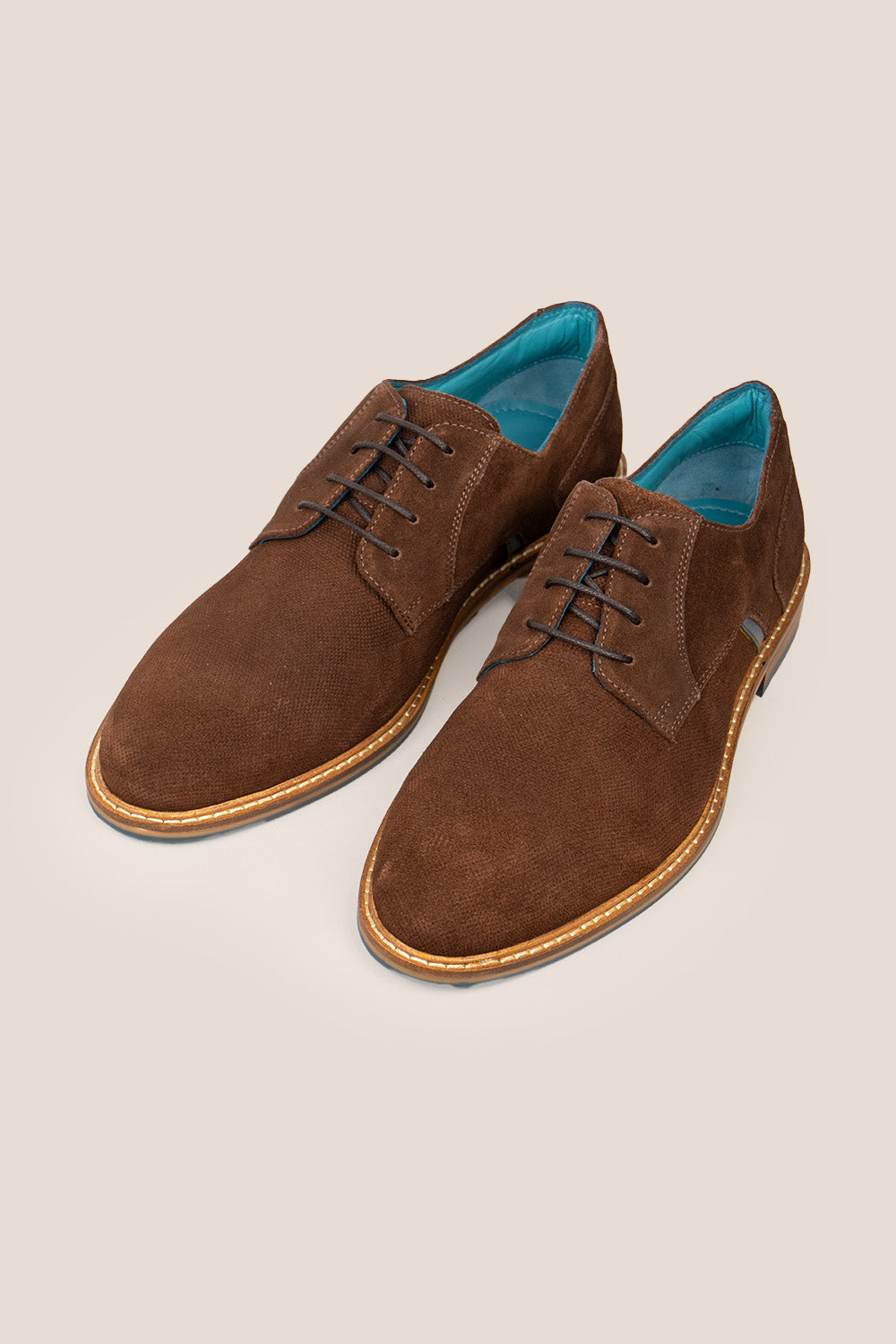 Paul Brown men’s suede derby shoes in brown with 4-eyelet lace-up design, crafted for style and comfort in formal and smart casual settings.