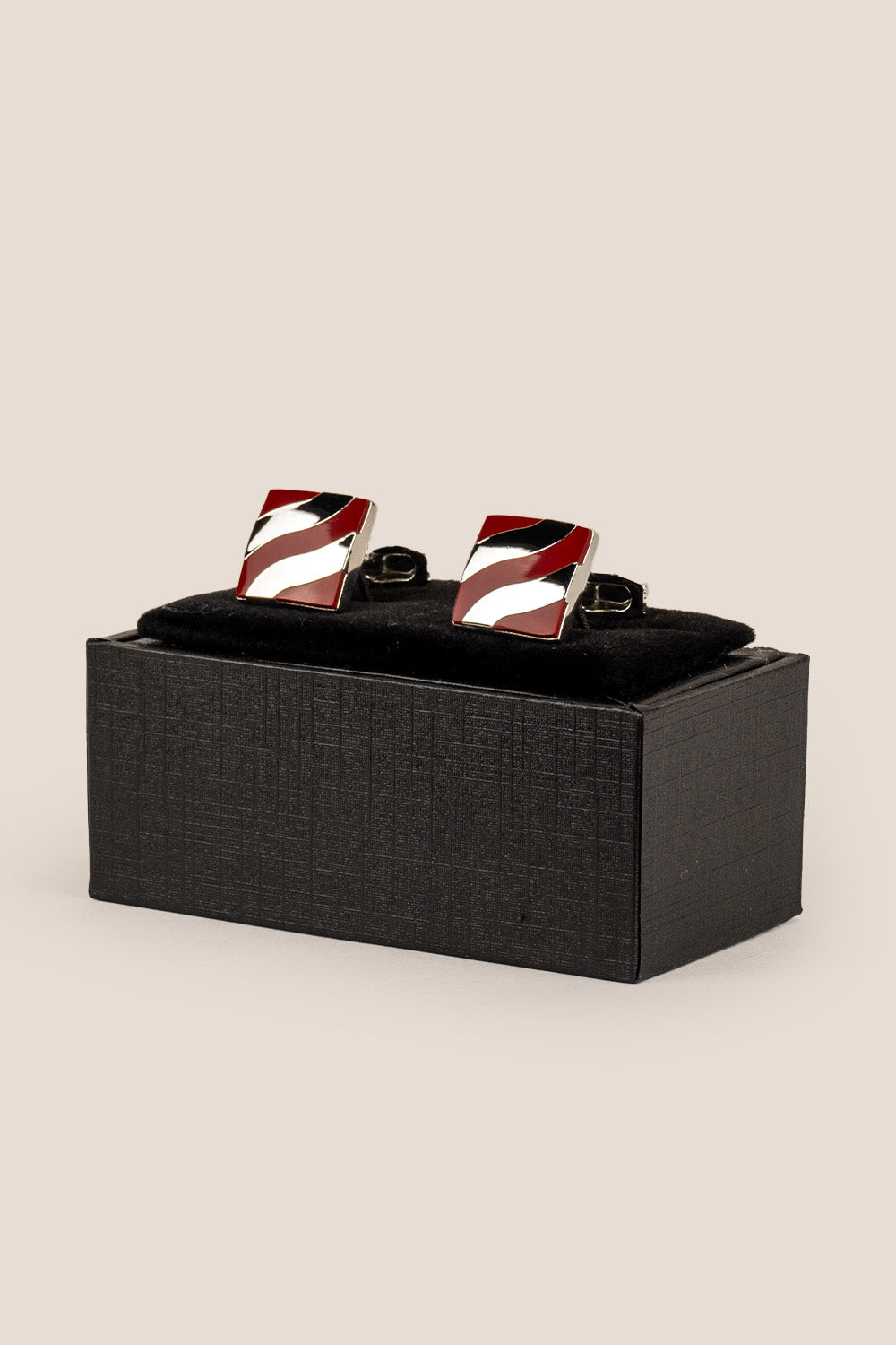 Men’s Kirk Red cufflinks with bold red enamel inlay and intricate metal detailing, crafted for precision and formal elegance.