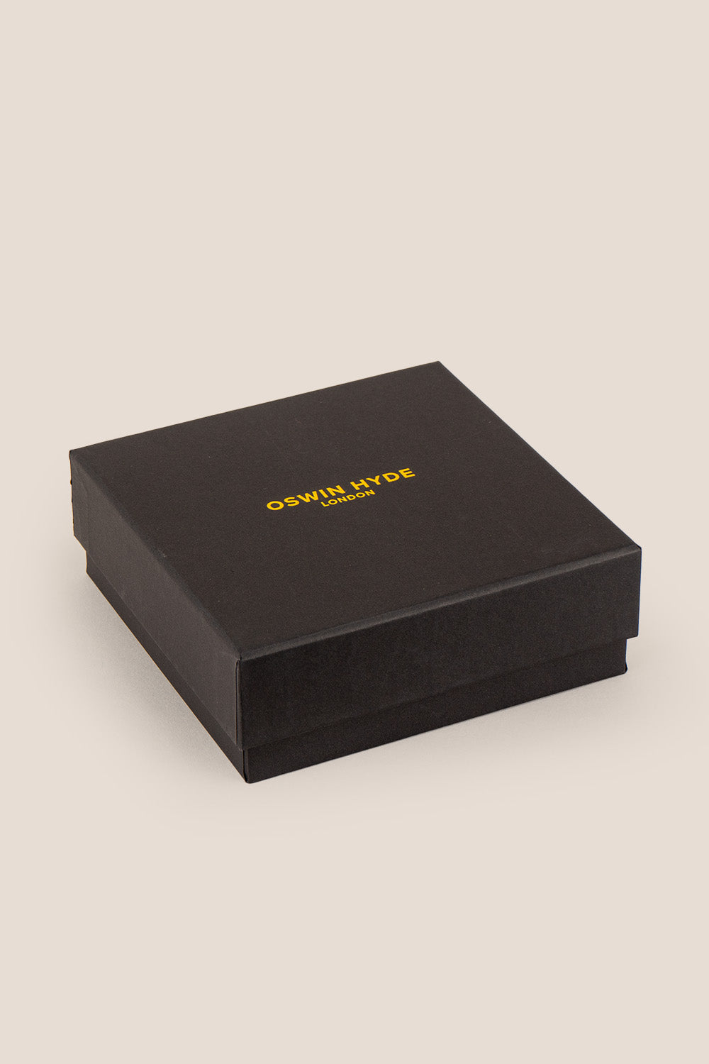 Reggie Black crocodile-embossed leather men’s belt with a classic pin buckle, offering a sleek and sophisticated finish to any outfit.