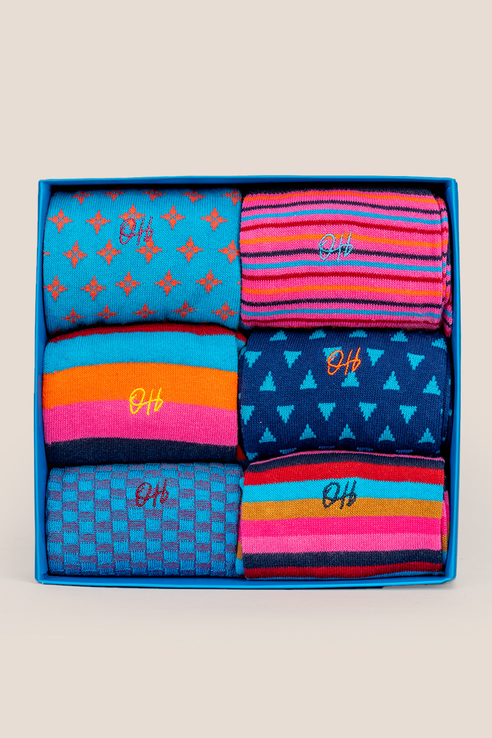 Oswin Hyde Contemporary six pairs of premium socks for men, featuring unique designs and timeless block colours.