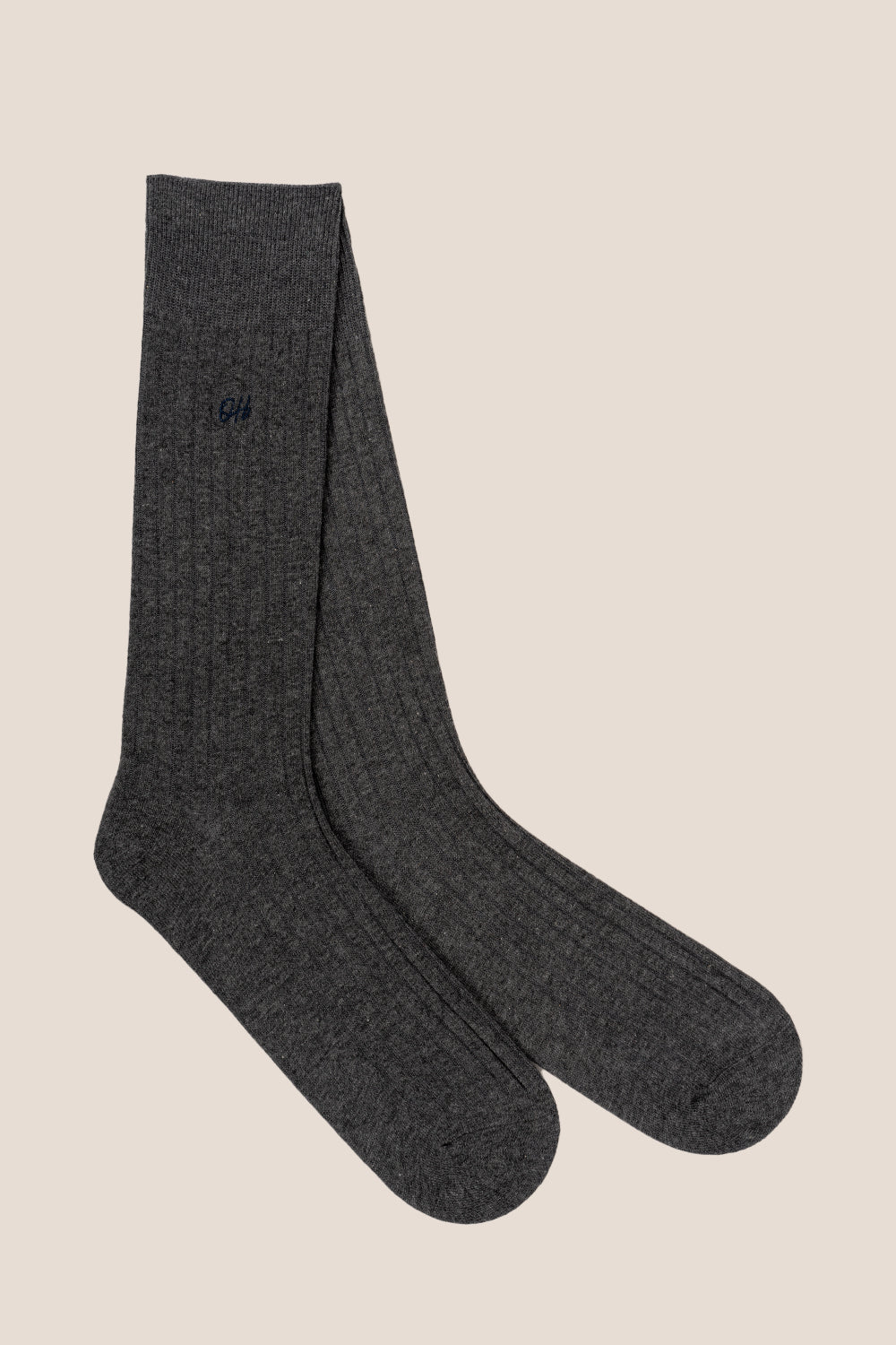 Oswin Hyde Mono three pairs of luxurious cotton socks for men in black, light grey, and dark grey.