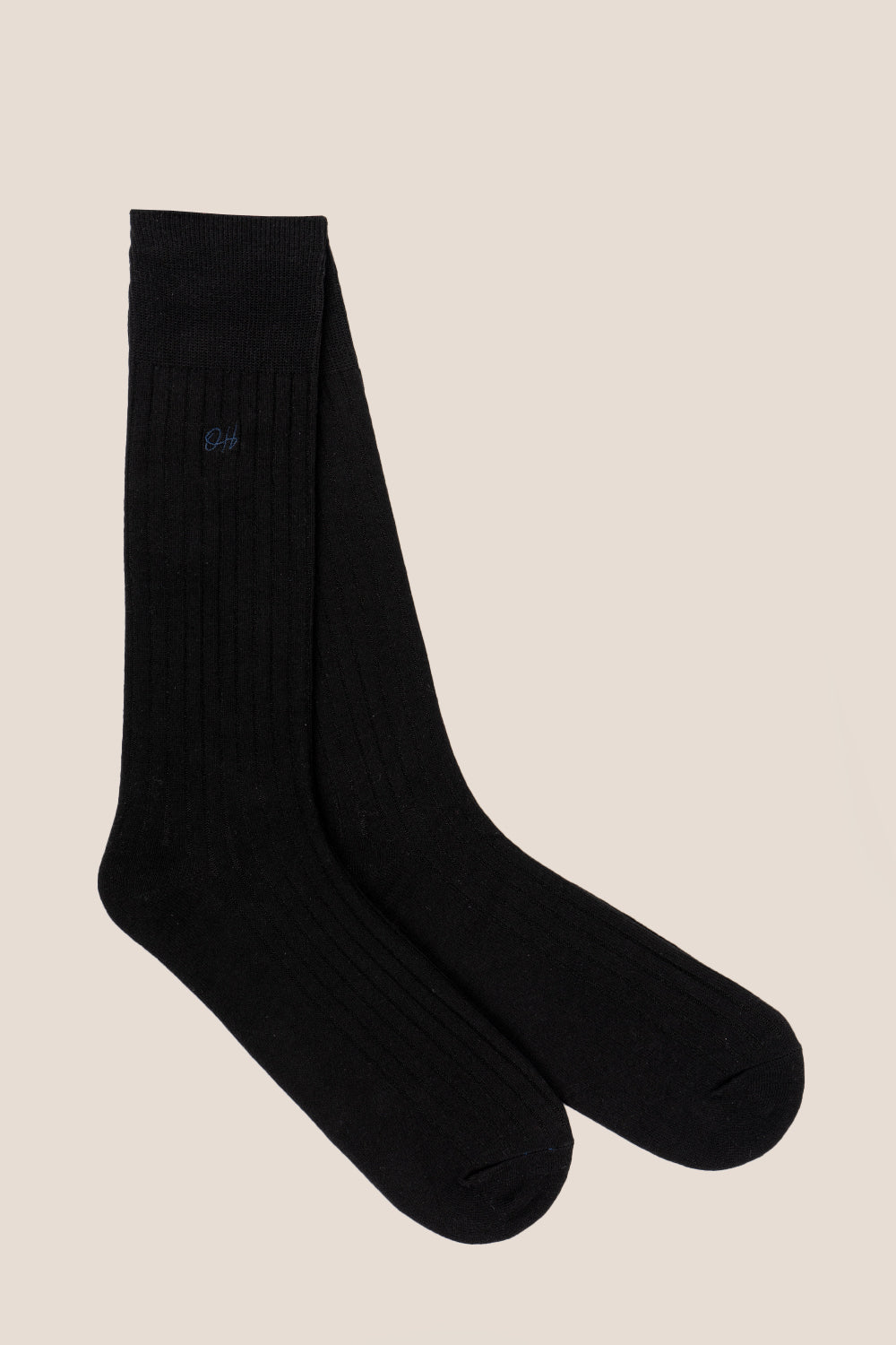 Oswin Hyde Mono three pairs of luxurious cotton socks for men in black, light grey, and dark grey.