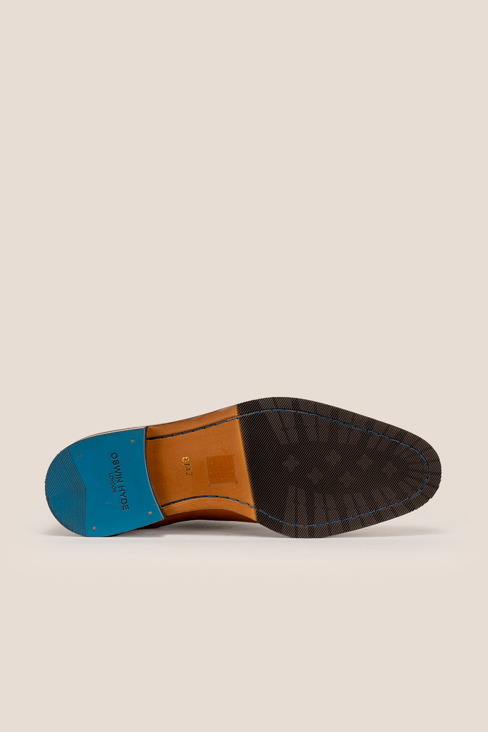 Men’s Melton Oxford shoes in tan leather with classic closed lacing and elegant detailing, perfect for formal and refined dress codes.