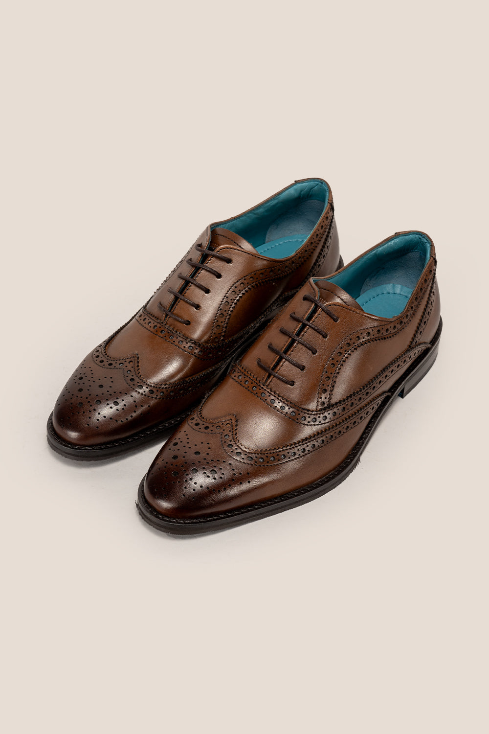 Stokes Brown Oxford Brogue Wing Cap leather shoes for men, crafted with premium brown leather and intricate brogue detailing for formal style.