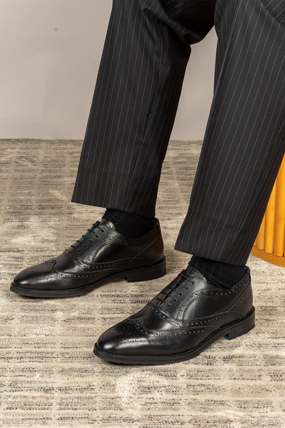 Stokes Black Oxford wing cap brogue men’s leather shoes crafted from premium leather with classic brogue detailing, ideal for formal wear.