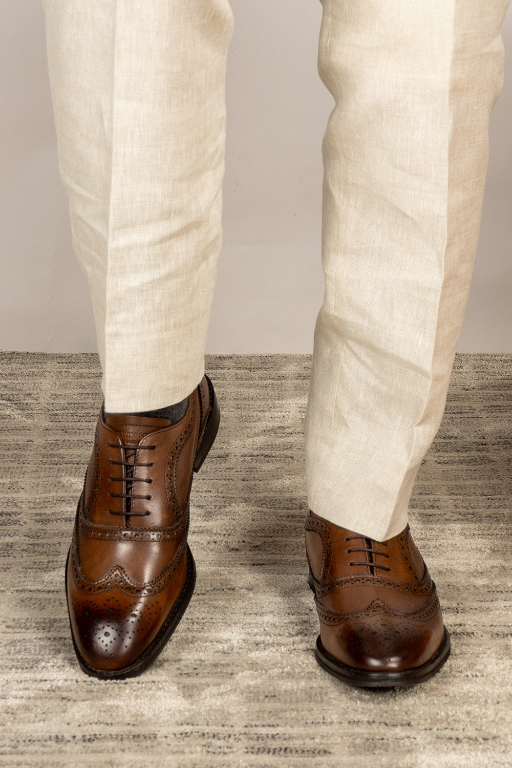 Stokes Brown Oxford Brogue Wing Cap leather shoes for men, crafted with premium brown leather and intricate brogue detailing for formal style.