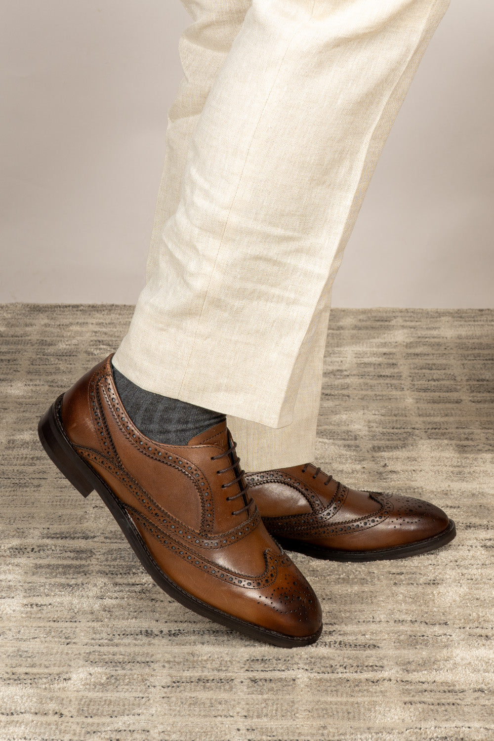 Stokes Brown Oxford Brogue Wing Cap leather shoes for men, crafted with premium brown leather and intricate brogue detailing for formal style.