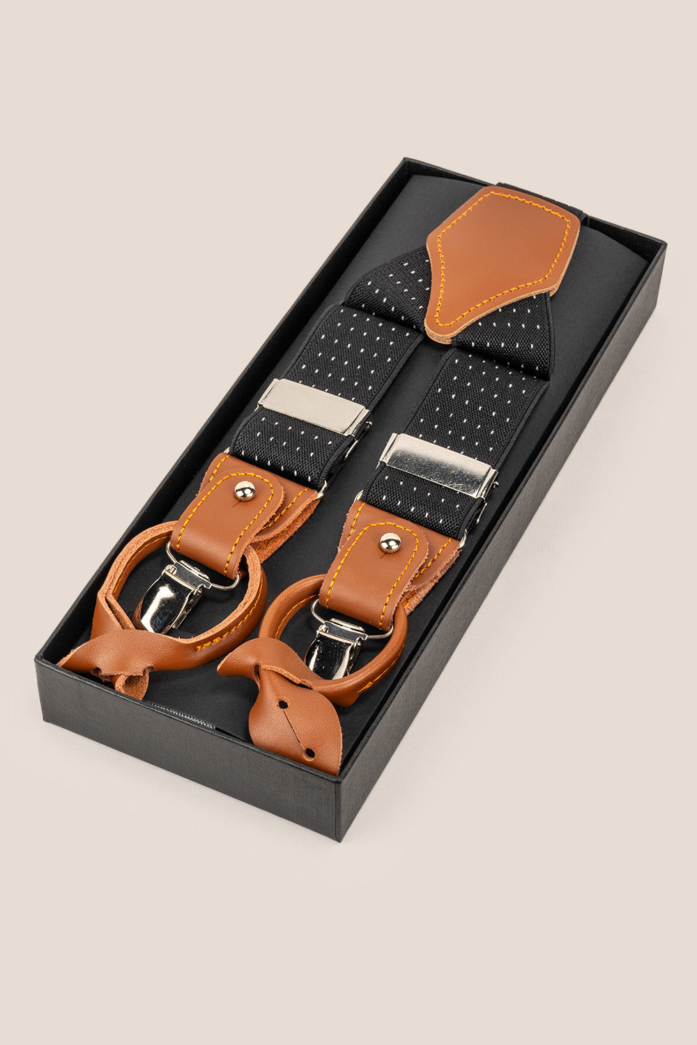 Men’s black polka dot combination suspenders with leather accents and adjustable clips, perfect for weddings, business, and elegant casual wear.