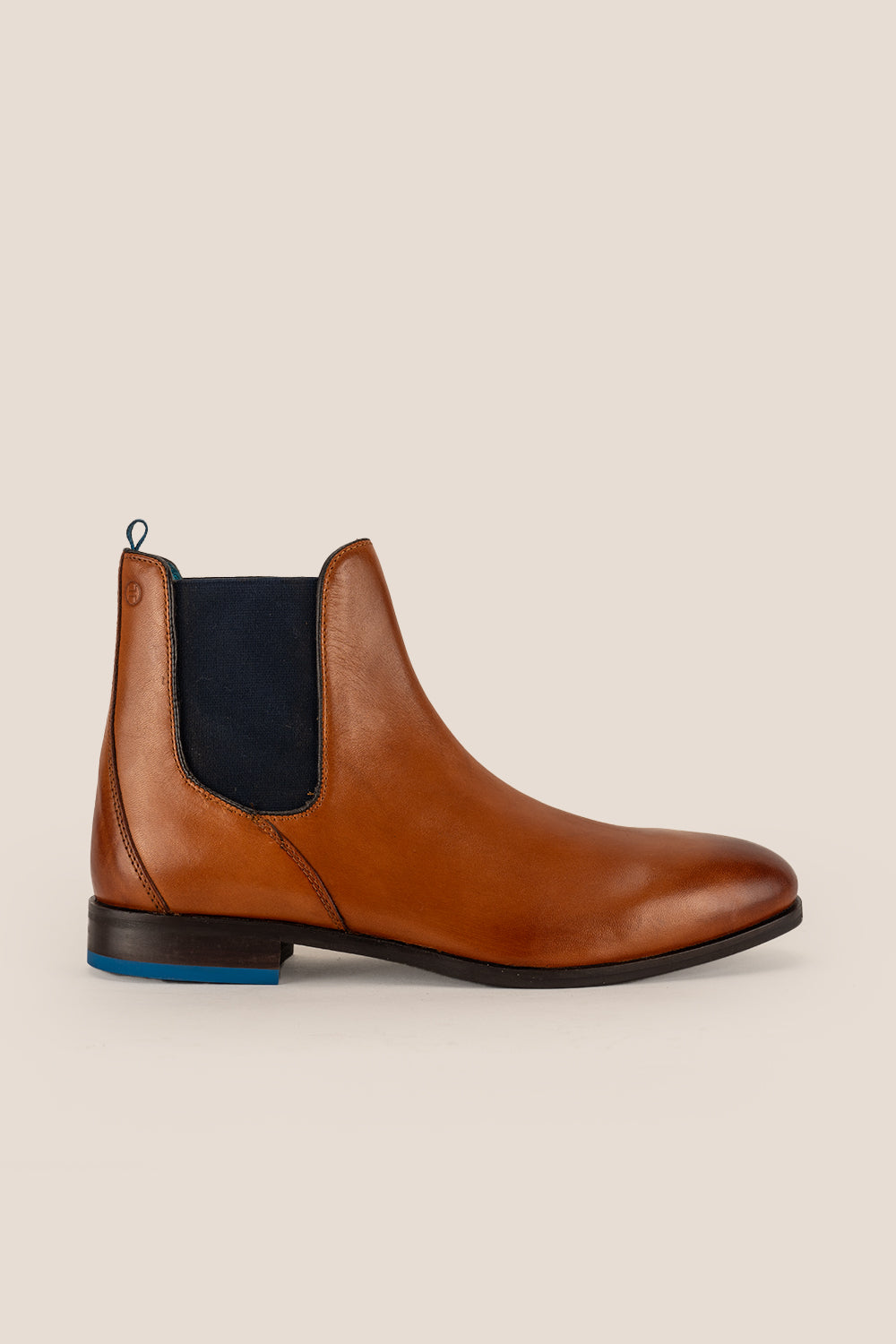 Tan leather Chelsea boots for men by Oswin Hyde – premium slip-on boots with elastic side panels, sleek silhouette, and refined modern style.