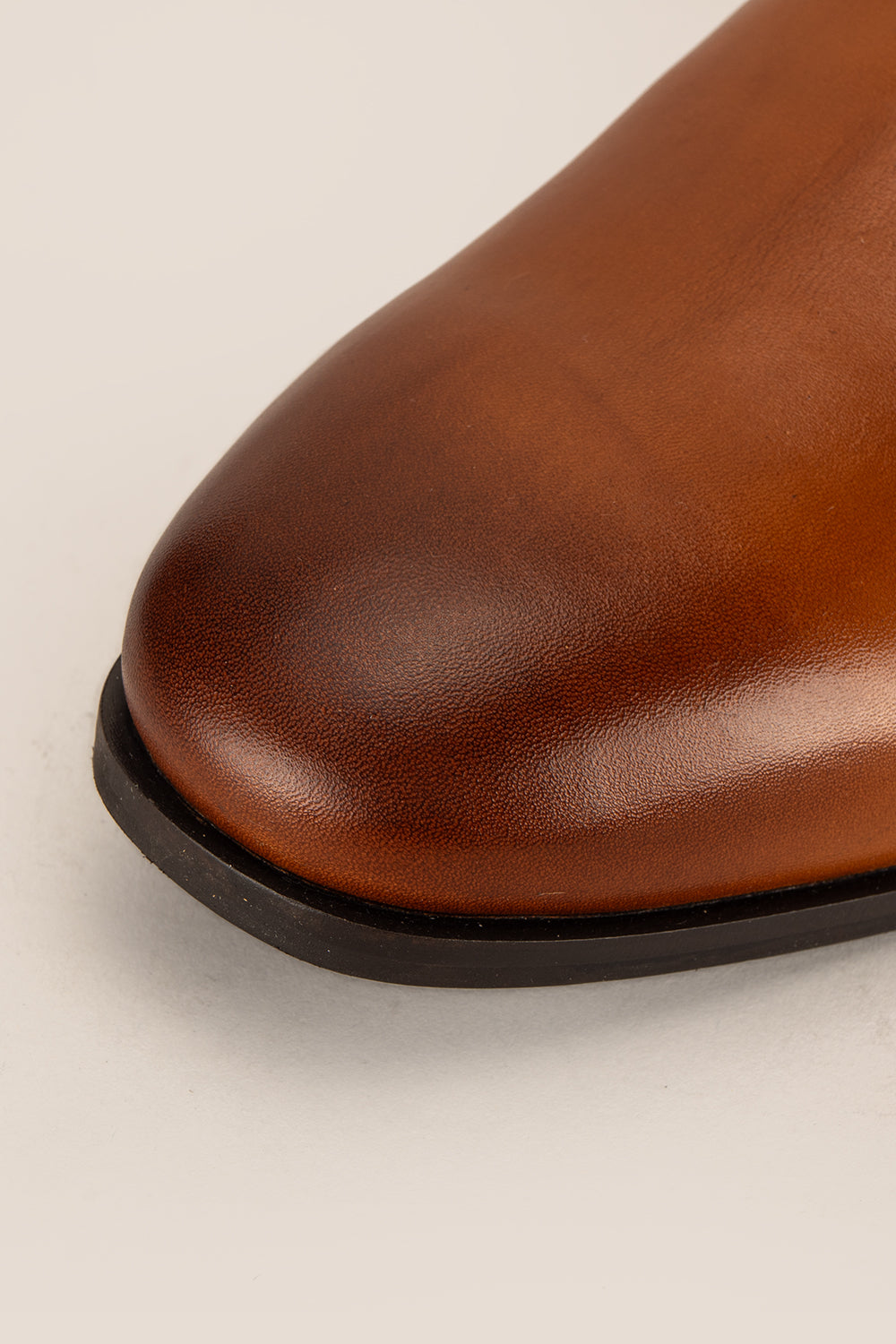 Tan leather Chelsea boots for men by Oswin Hyde – premium slip-on boots with elastic side panels, sleek silhouette, and refined modern style.