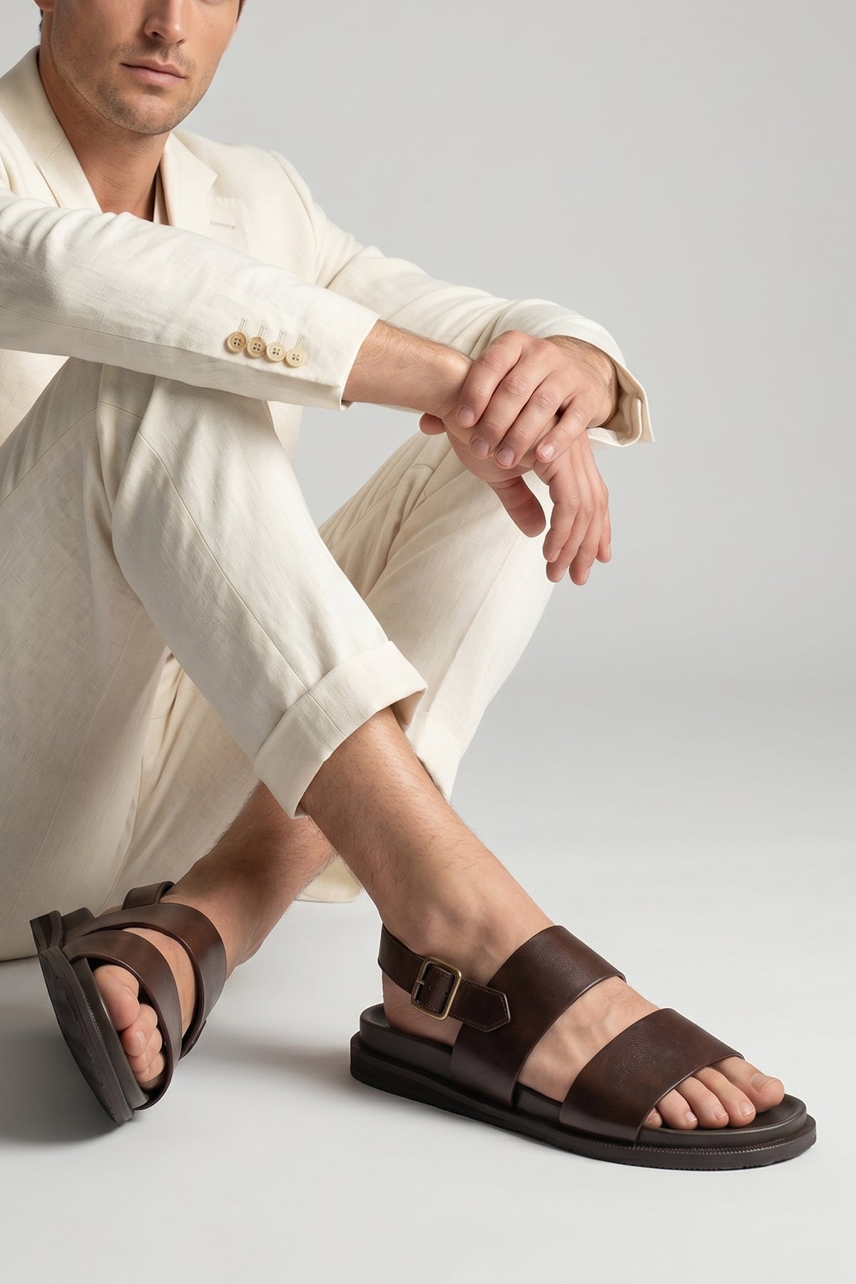 Antonio Brown double strap leather sandals in dark brown worn by a male model, showcasing premium genuine leather and a luxurious design, suitable for stylish men's footwear.