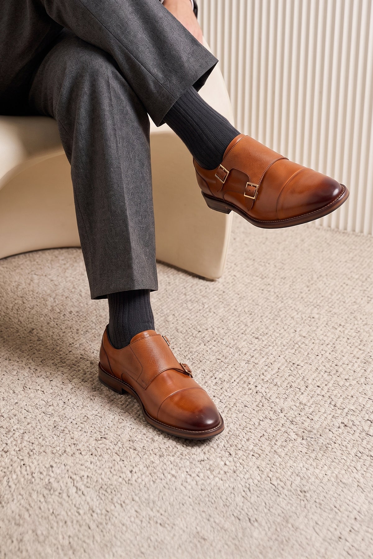Kayden Tan leather monk strap shoes by OSWIN HYDE for men. Toe cap designed with saffiano print, cushioned insole and padded topline.