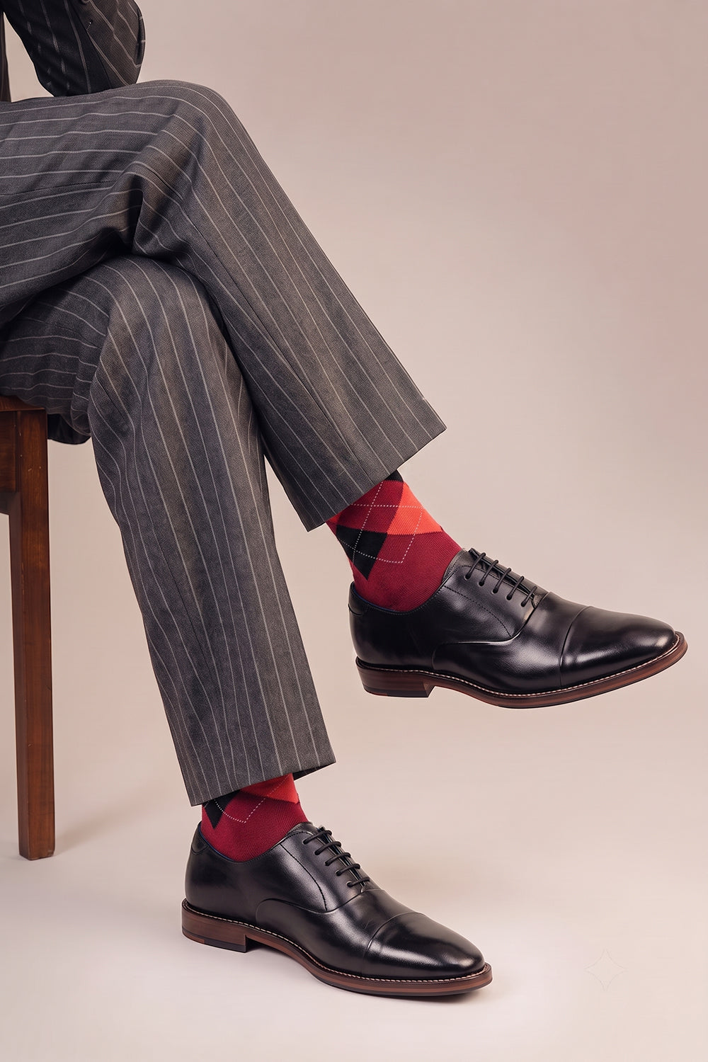 Model wearing Premium cotton bold argyle socks designed by Oswin Hyde for the discerning gentleman.