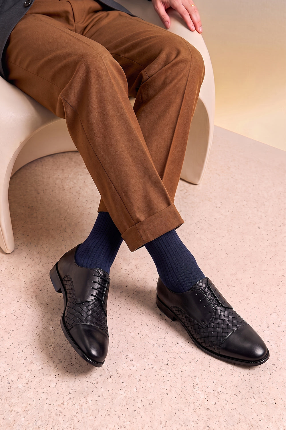Model wearing Premium Navy cotton socks designed by Oswin Hyde for the discerning gentleman.