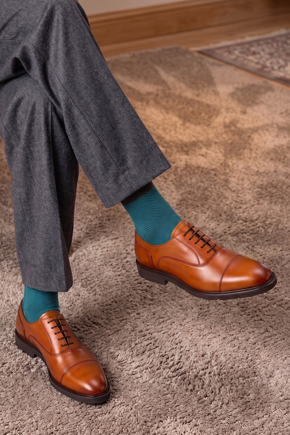Model wearing Premium herringbone socks designed by Oswin Hyde for the discerning gentleman.
