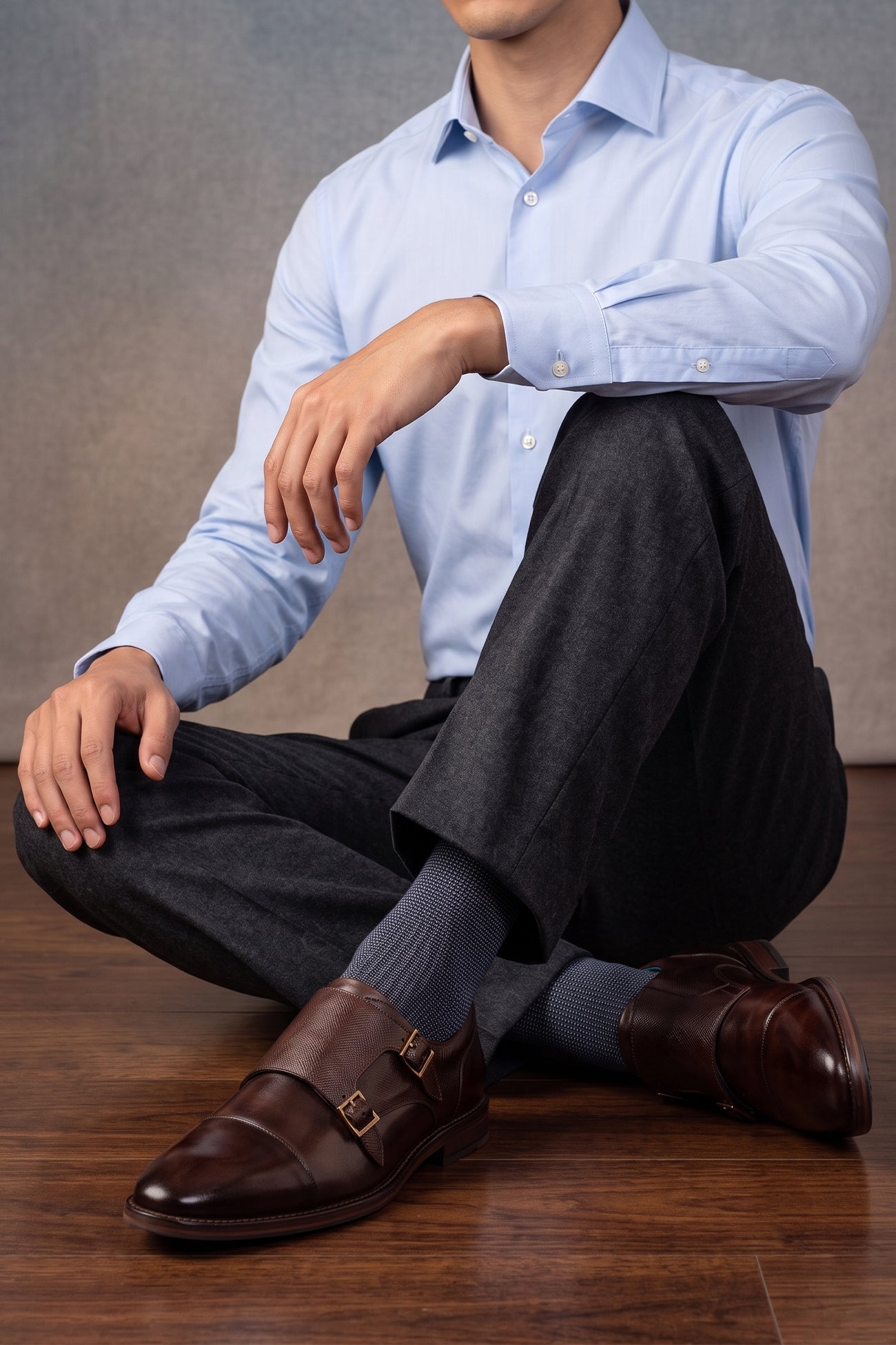 Model wearing Kayden Brown leather monk strap shoes by OSWIN HYDE for men. Toe cap designed with saffiano print, cushioned insole and padded topline.
