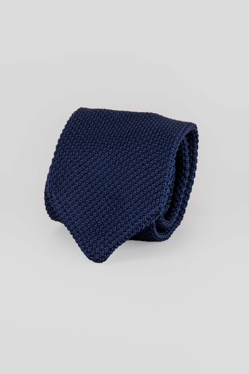 Ash Navy knitted tie with hand finishing, perfect for weddings and formal occasions.