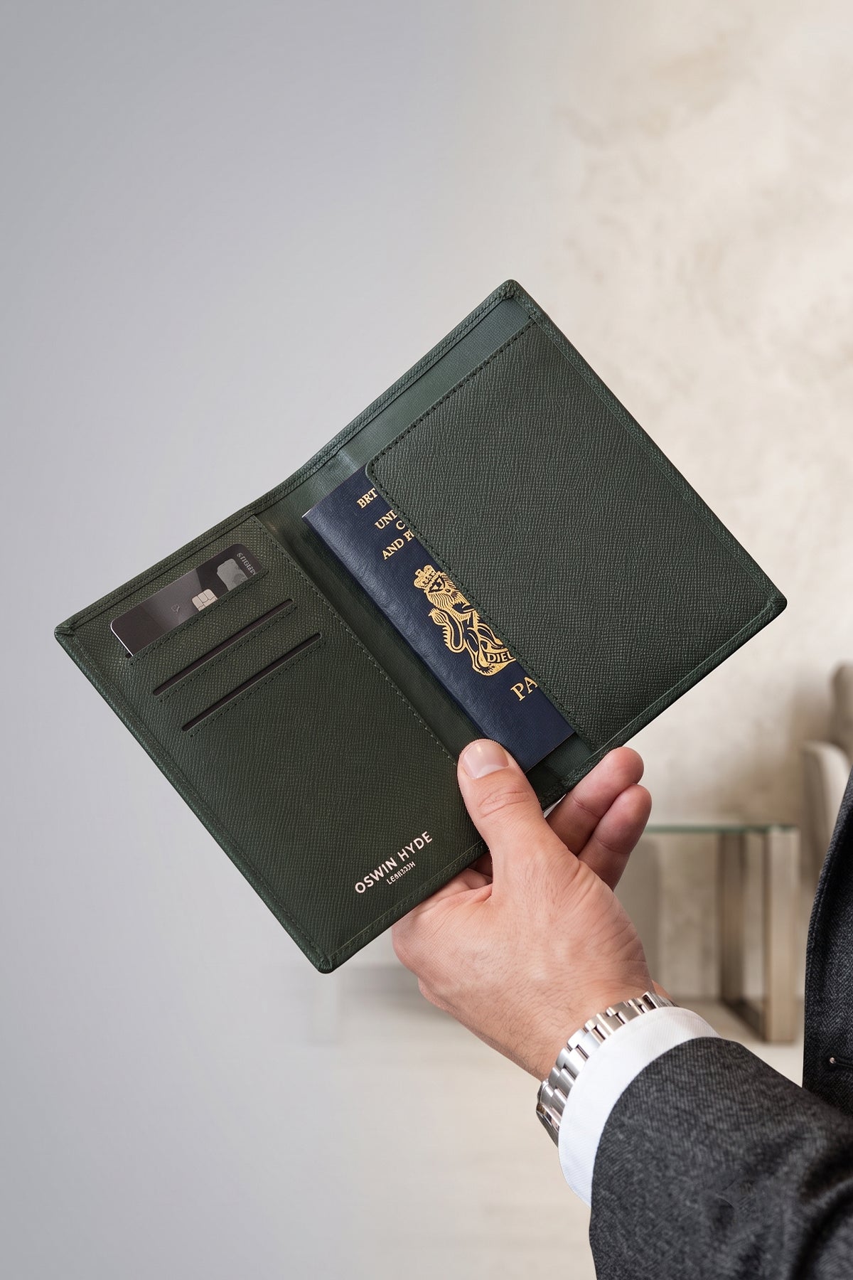 Man holding Covent Green Passport Holder | Oswin Hyde