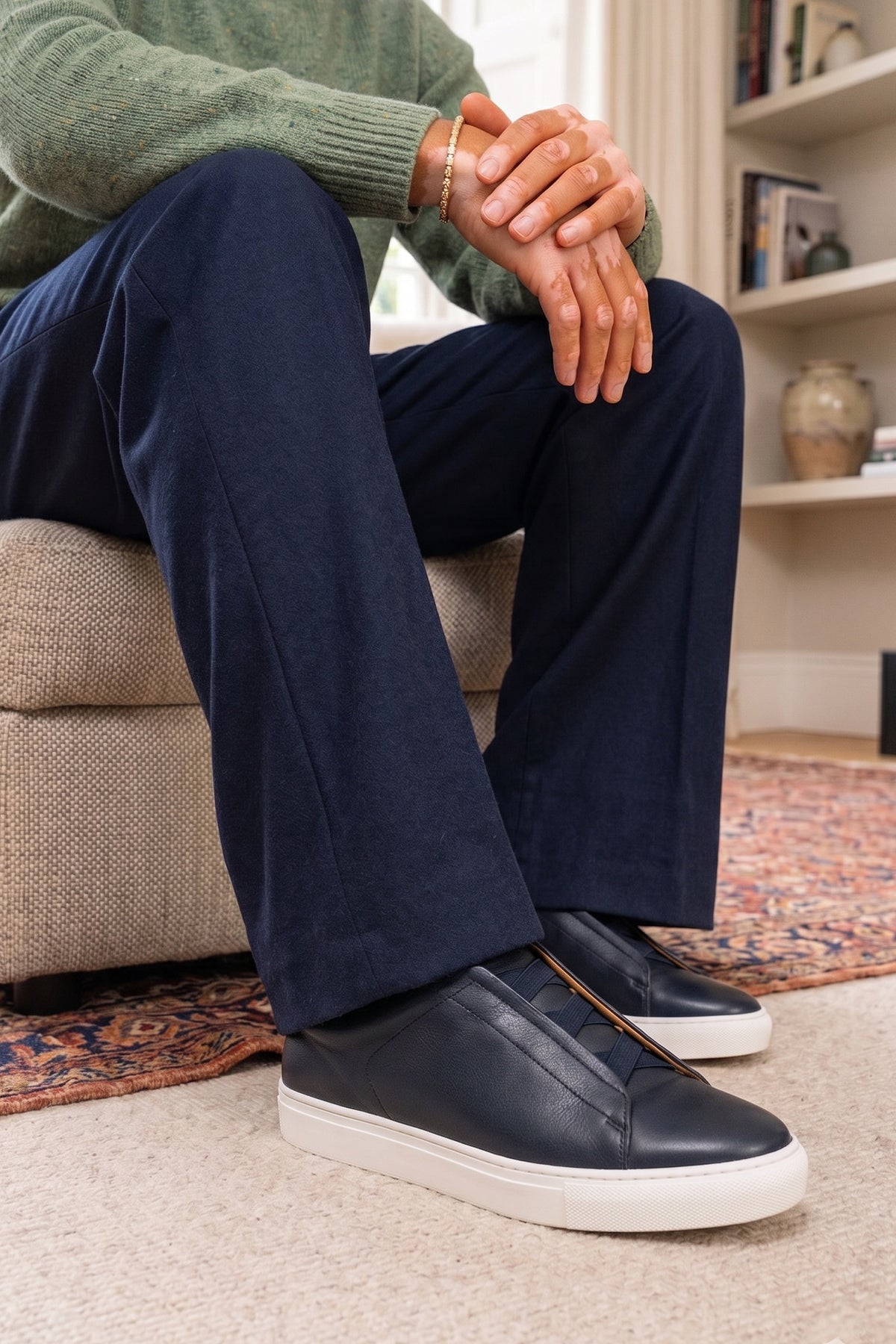 Model wearing Smudge Navy Suede Sneakers for Men. Crafted from premium suede, offering lightweight wear, modern style