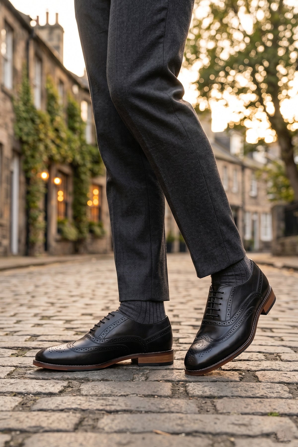 Experience comfort and style with the Winston Black Wide Fit brogue. Premium leather, classic brogue detailing, and extra room for all-day wear.