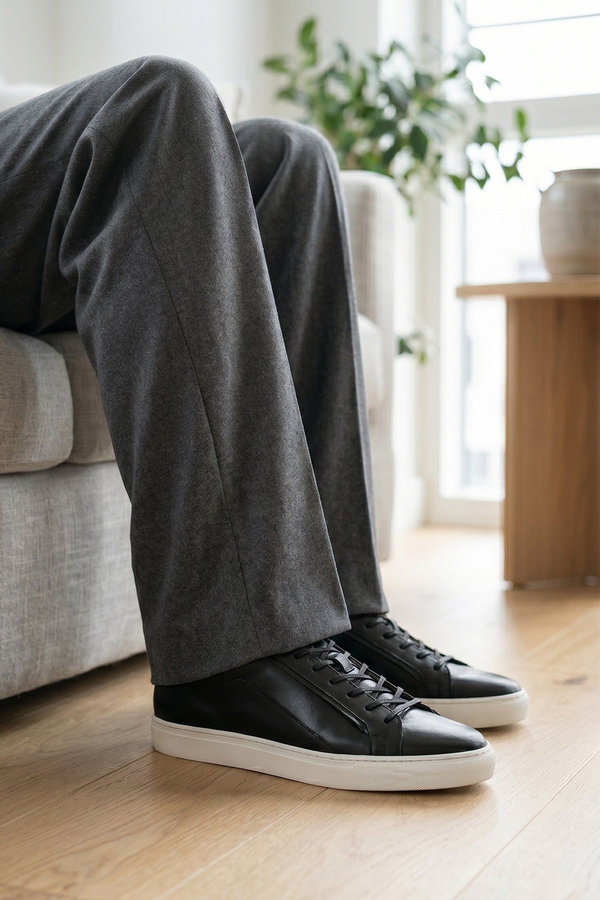 Hayes Black leather sneakers for men, featuring a classic seven-eyelet design that brings a touch of sophistication to your casual wardrobe. Made from premium leather