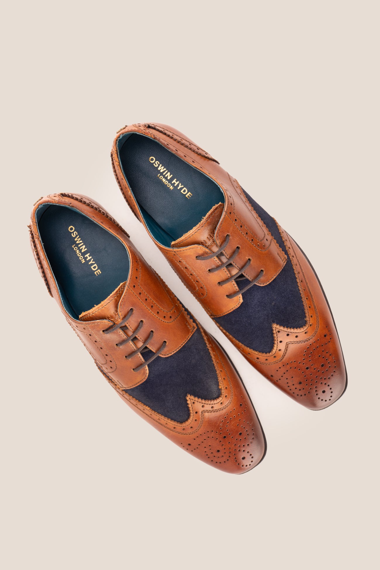 Miller Tan Navy Suede men’s leather and navy suede brogue shoes with wingtip detailing.