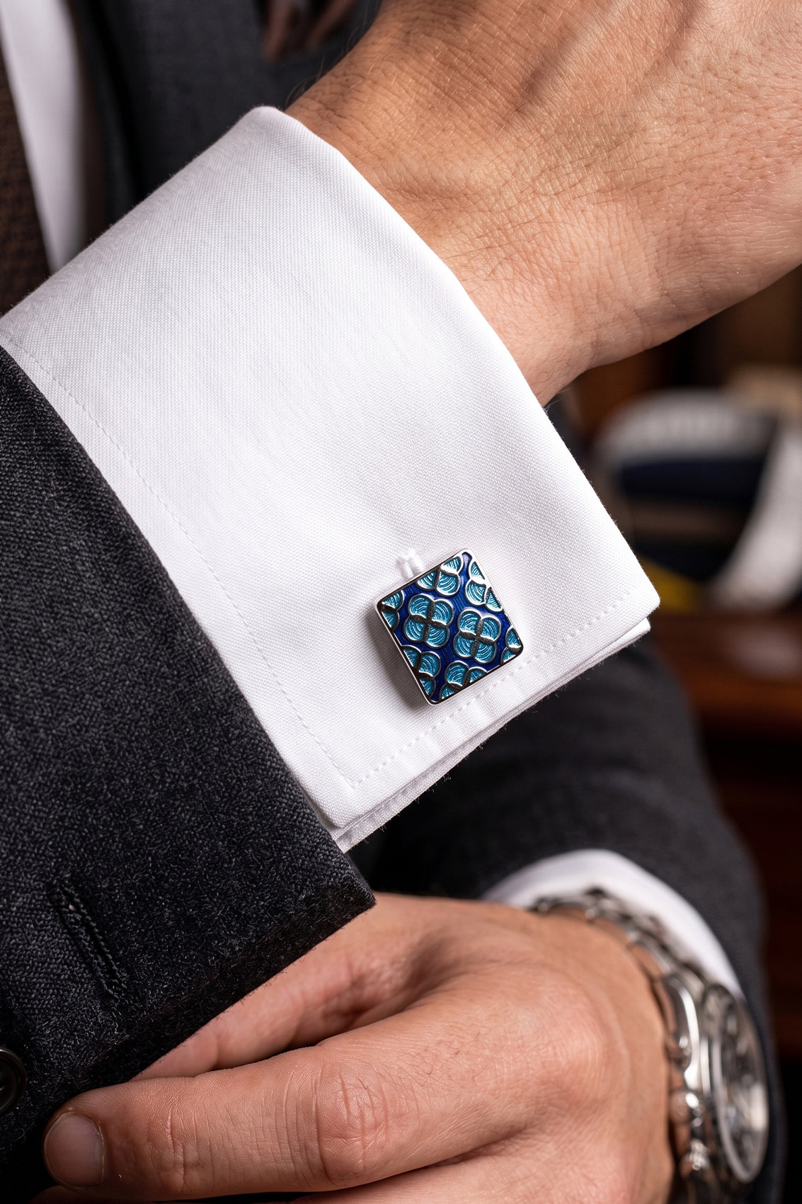 Leon Black men’s cufflinks with a blue geometric design set in polished metal, crafted for luxury precision and formal elegance.