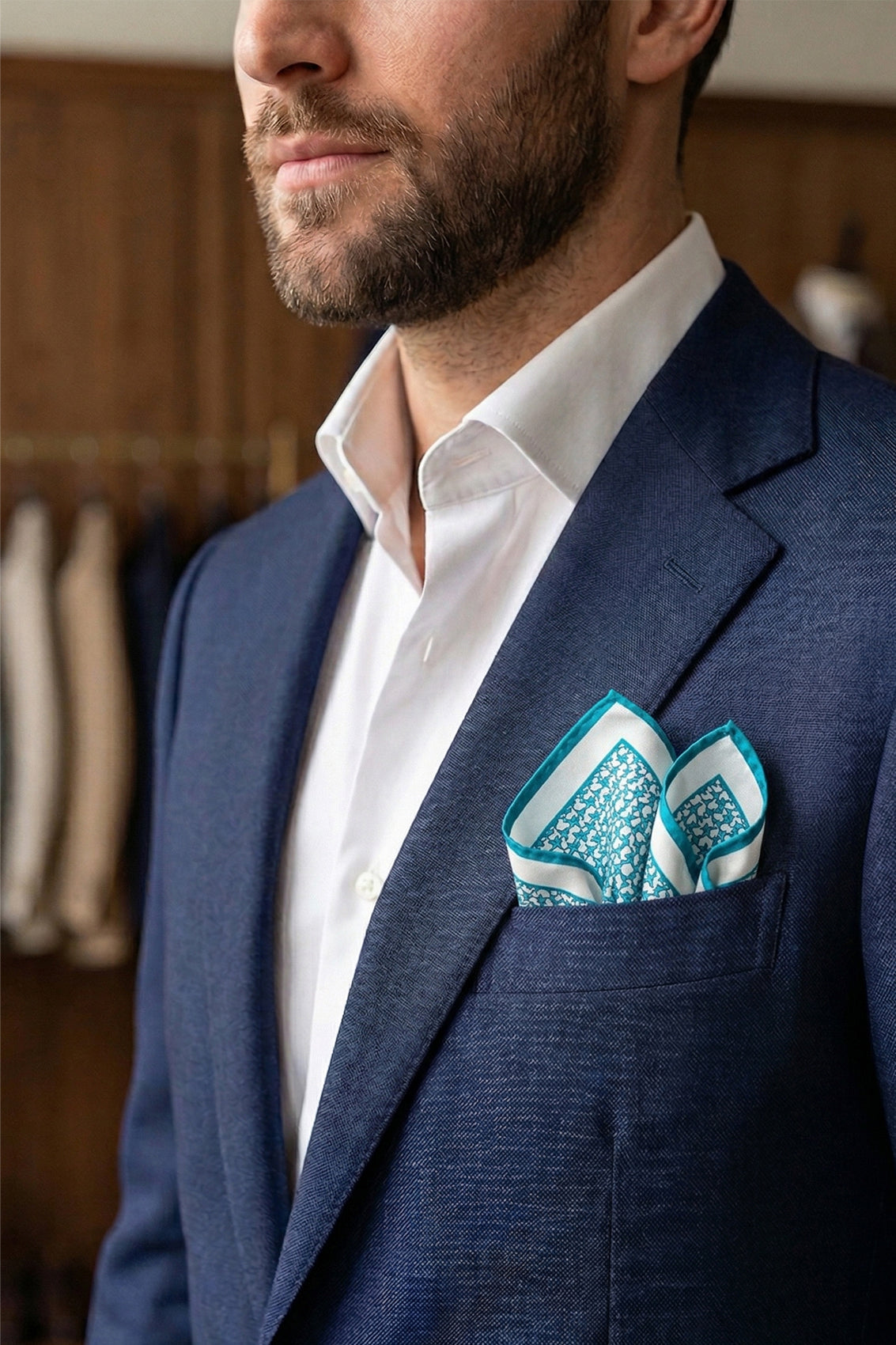 Blue silk pocket square handkerchief with a blue star print and four versatile folds, ideal for wedding, business or refined casual wear.