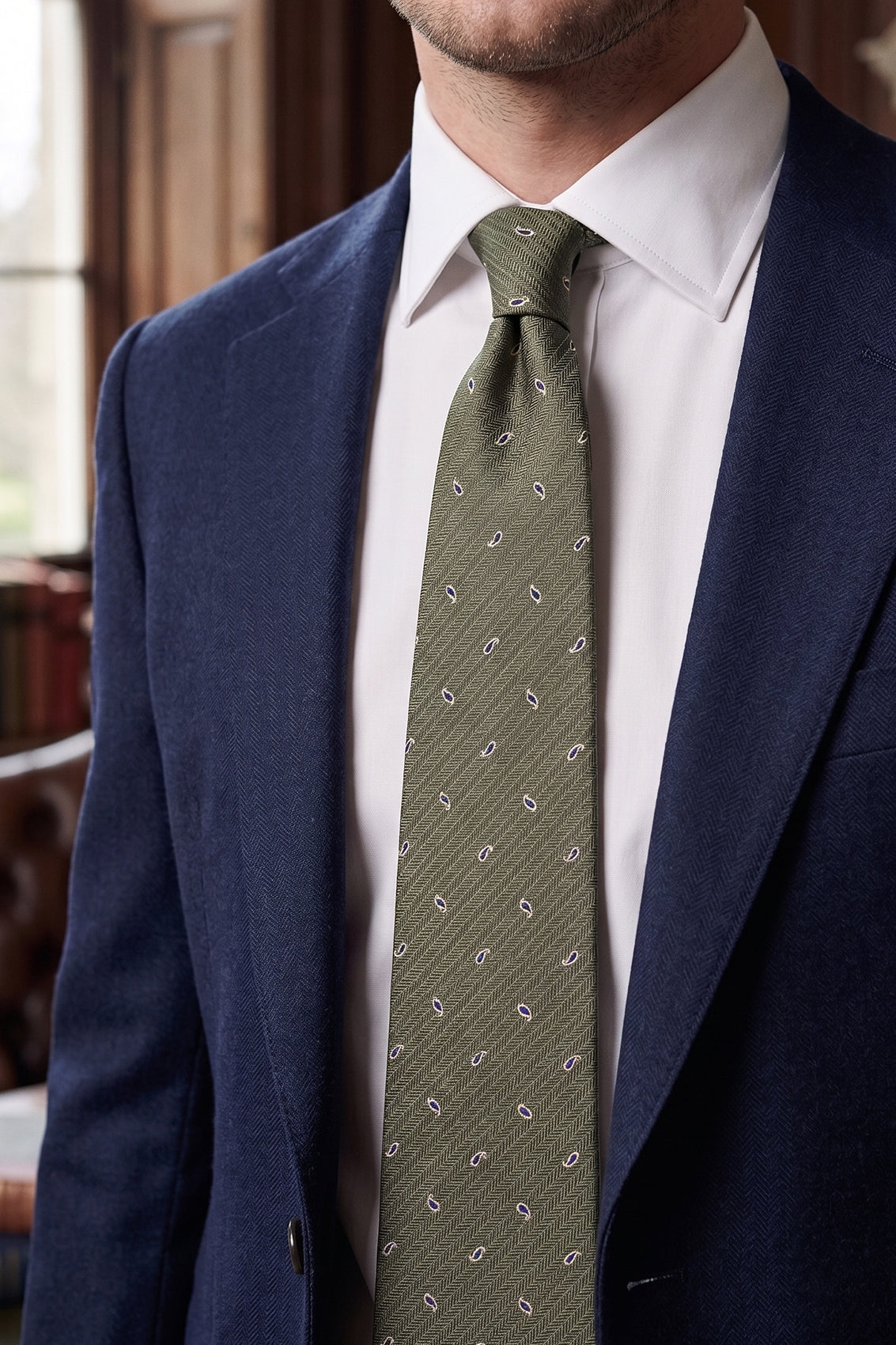 Oswin Hyde Green Micro Paisley ties for men. Featuring a subtle paisley pattern in a rich green hue, made from high-quality material.