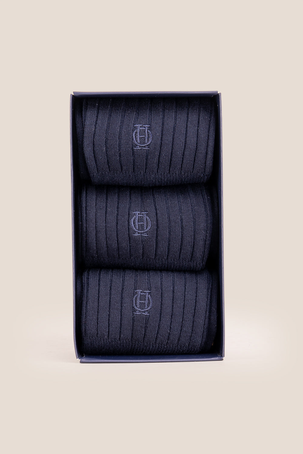 Three pairs of premium Navy cotton socks designed by Oswin Hyde for the discerning gentleman.