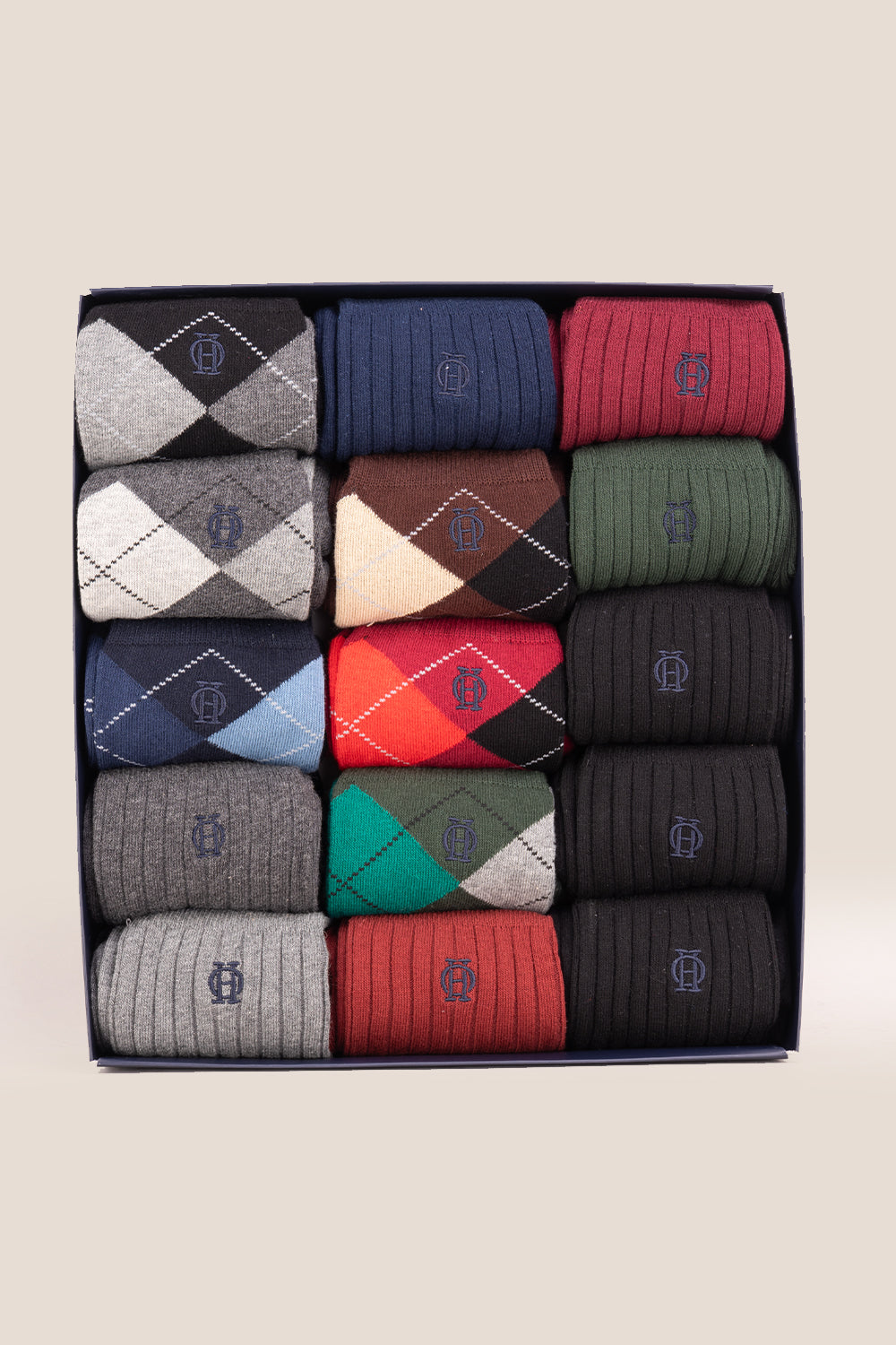 Fifteen pairs of premium cotton socks designed by Oswin Hyde for the discerning gentleman.