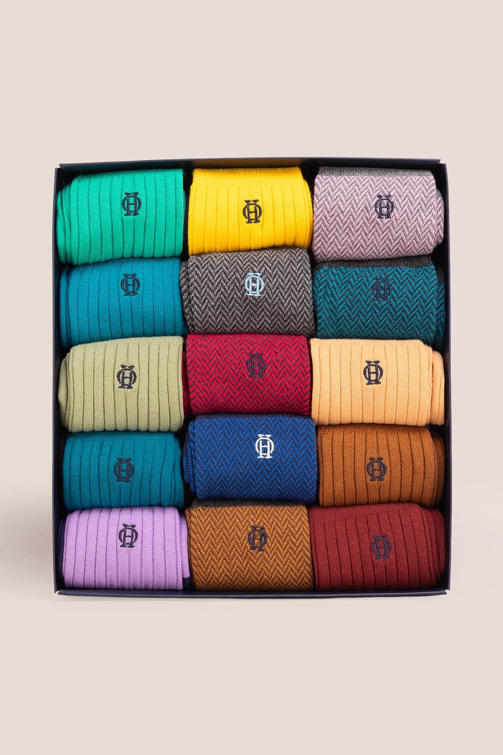 Fifteen pairs of premium herringbone socks designed by Oswin Hyde for the discerning gentleman.