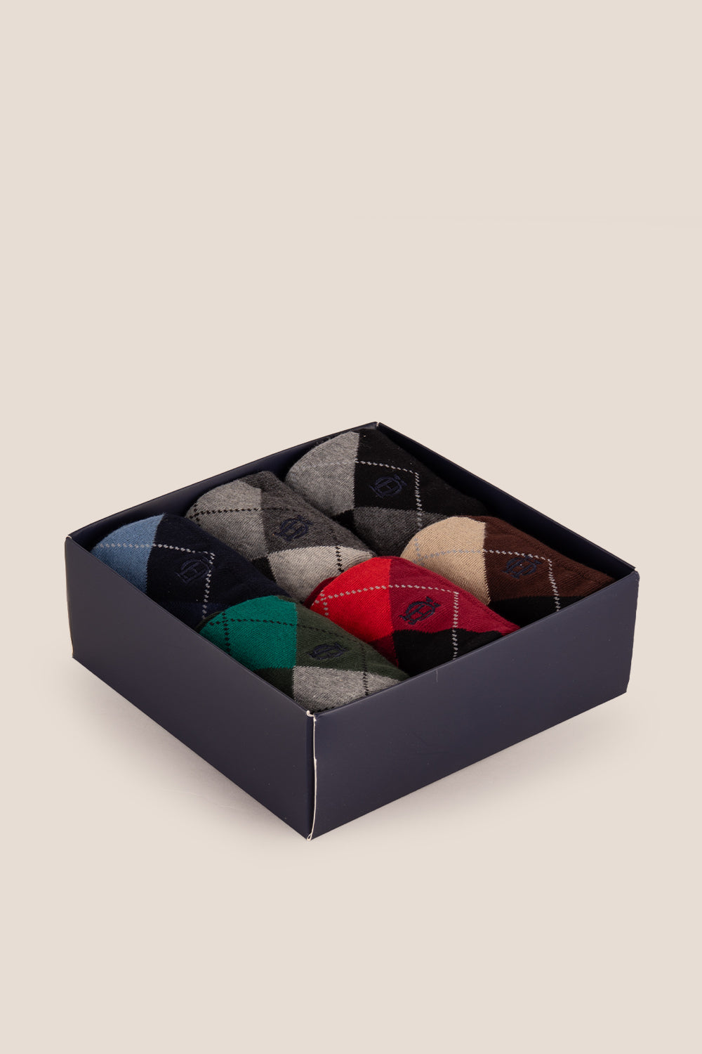 Six pairs of premium cotton socks designed by Oswin Hyde for the discerning gentleman.