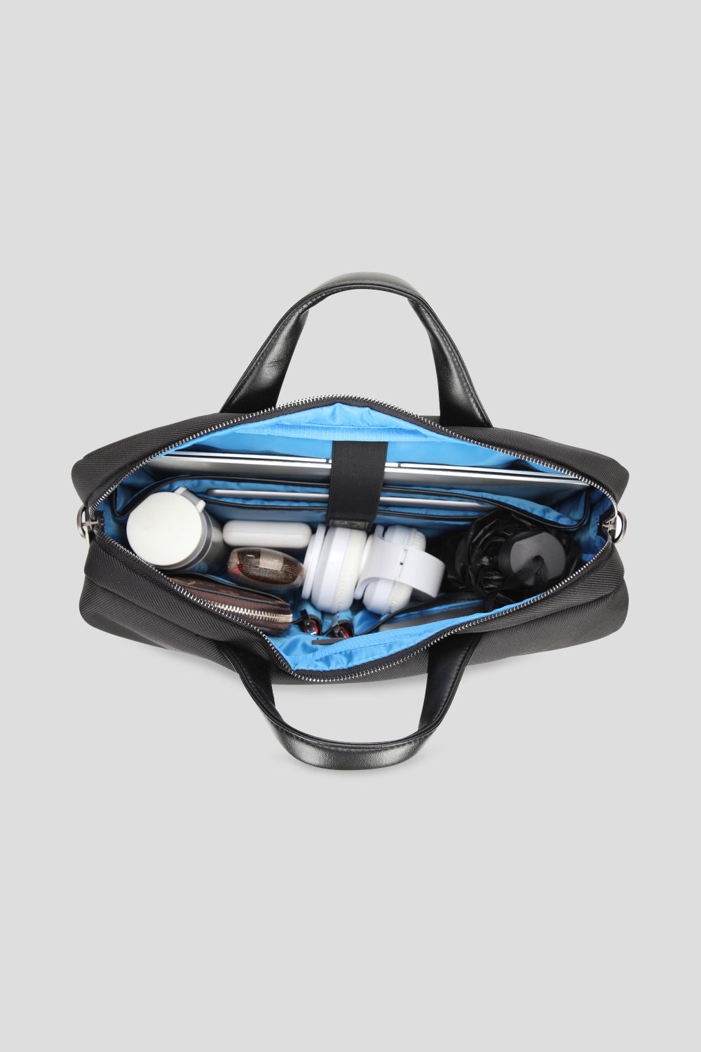 Black Bond laptop bag for men with adjustable shoulder straps, rugged polyester shell, and padded interior—perfect for office and urban commutes.