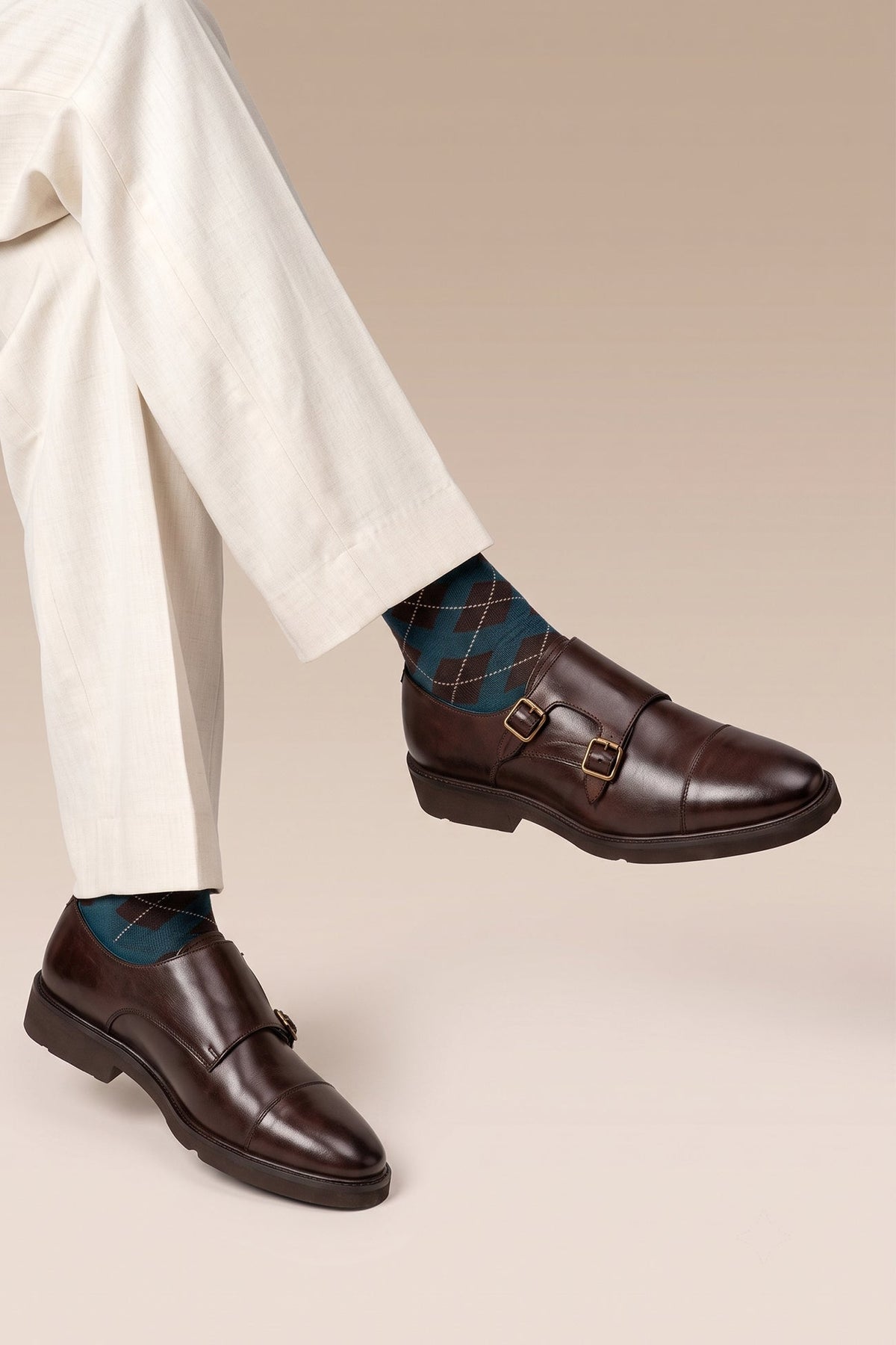 Model wearing Garson Brown double monk strap shoes
