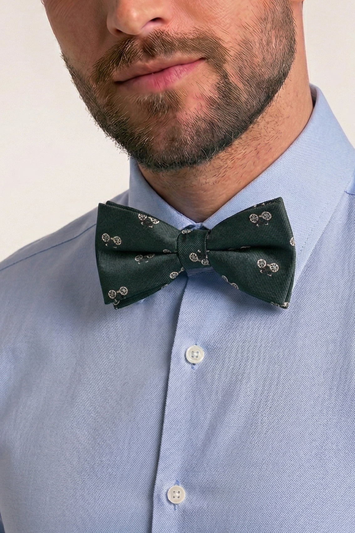 Green Cycle Bow Tie featuring a vibrant green shade with a playful cycling-inspired pattern, adding a touch of character and charm to any formal or casual outfit.