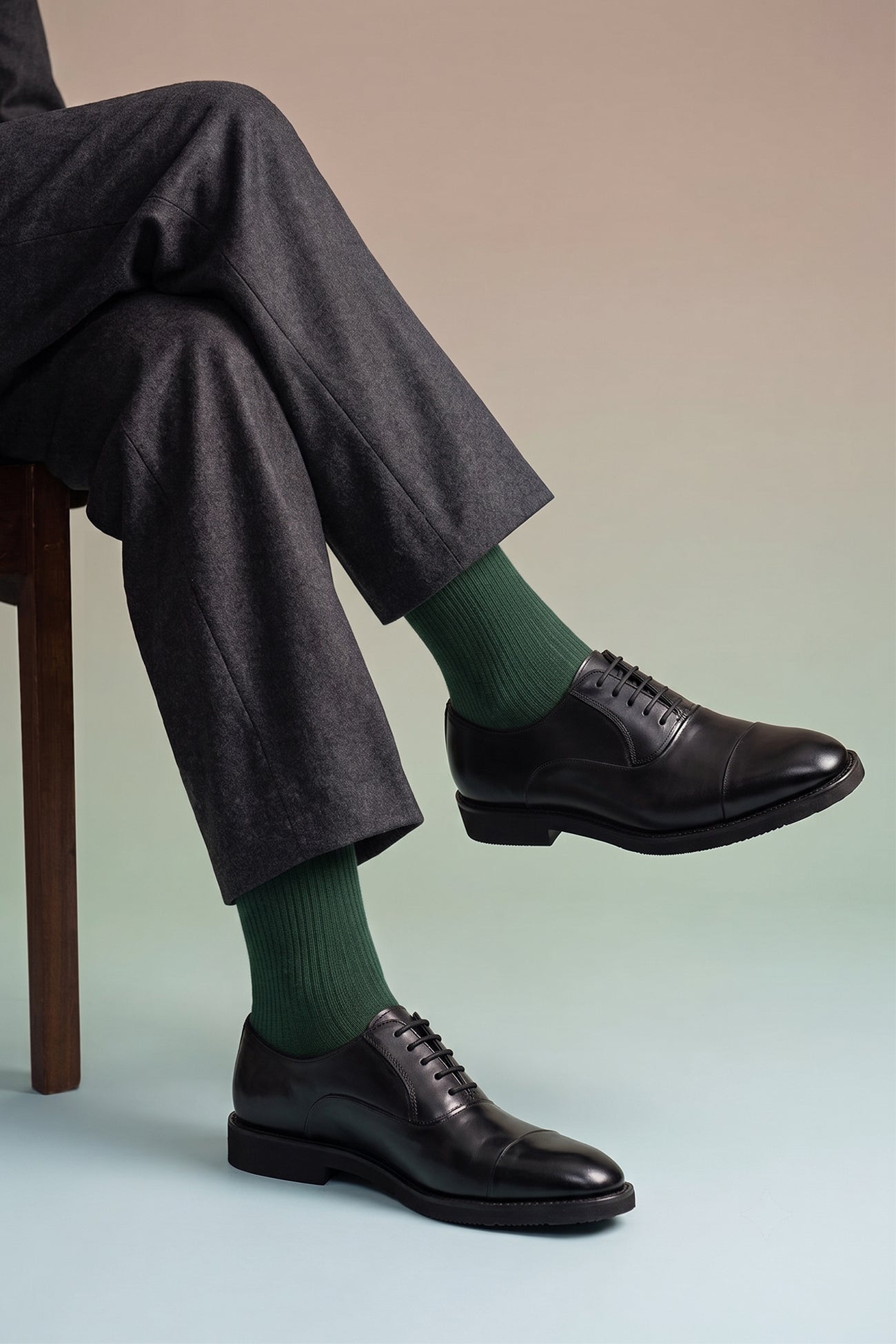 Man wearing Grayson black Derby men’s leather shoes with a sleek finish and classic lace-up style, ideal for formal and office wear.