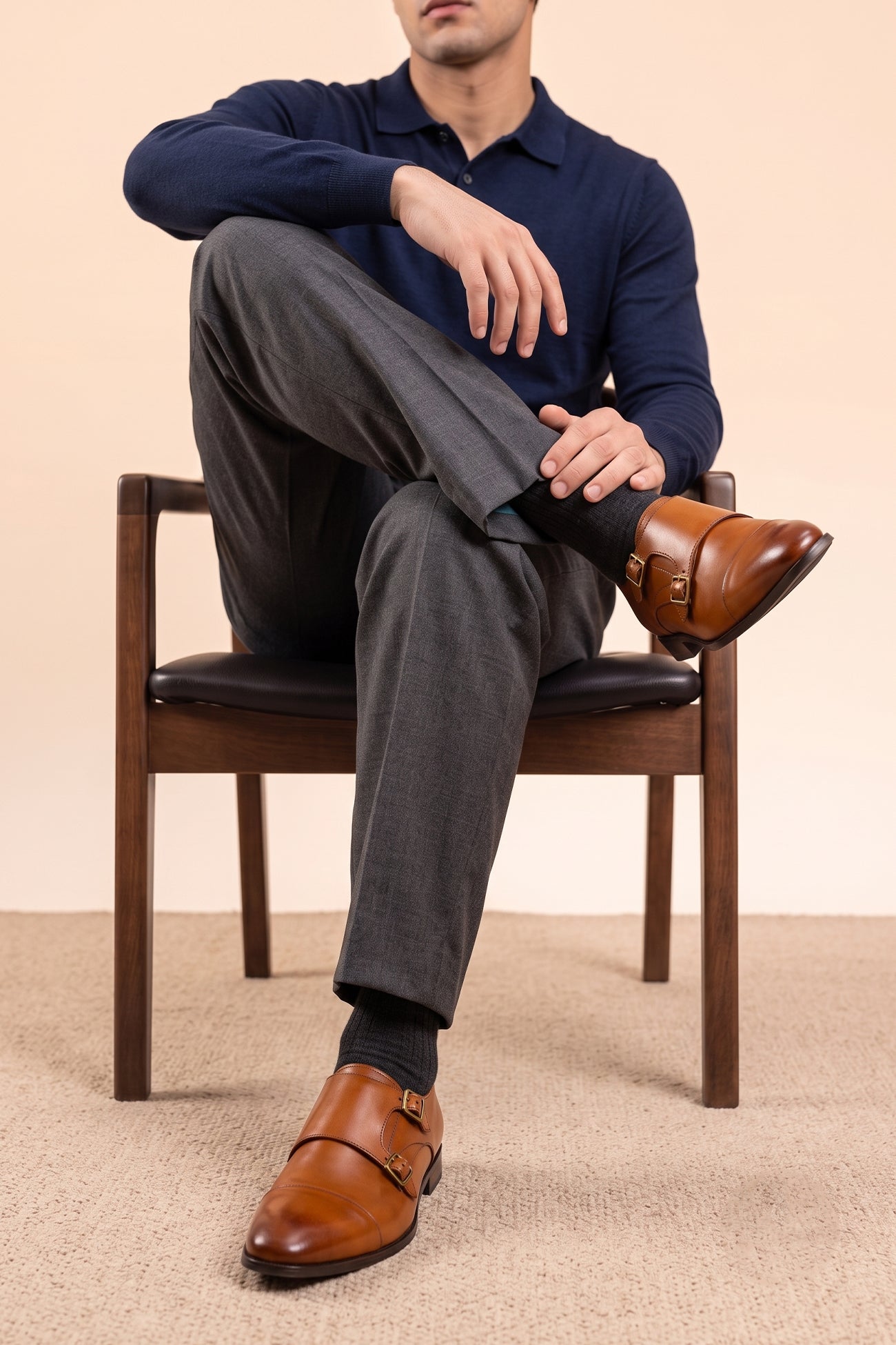 Model wearing Hadley tan monk strap leather men’s shoes with single buckle design, crafted in high-quality leather and finished with a sleek leather sole.