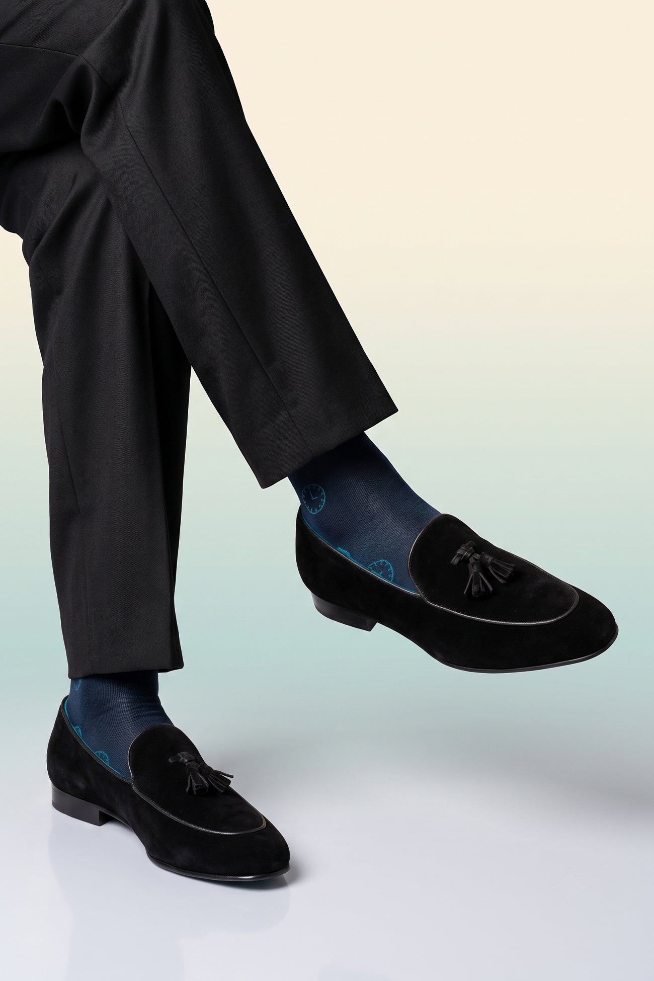 Man wearing Barclays Black suede tassel loafer for men featuring premium suede and classic tassel design, ideal for formal and smart casual occasions.