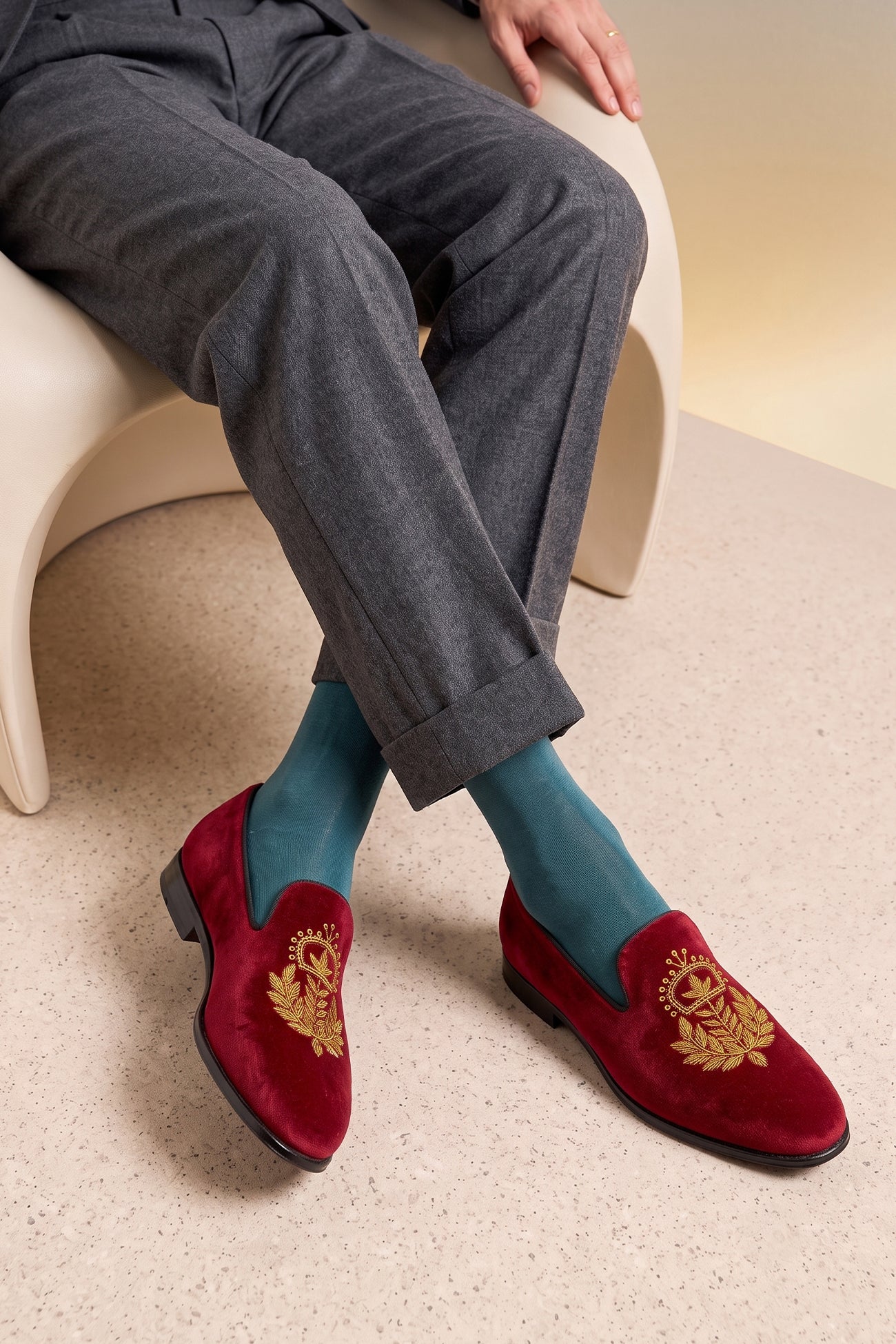 Model wearing Archer Bordo velvet slip-on loafers for men featuring plush velvet material and sleek design, ideal for formal and smart casual occasions.