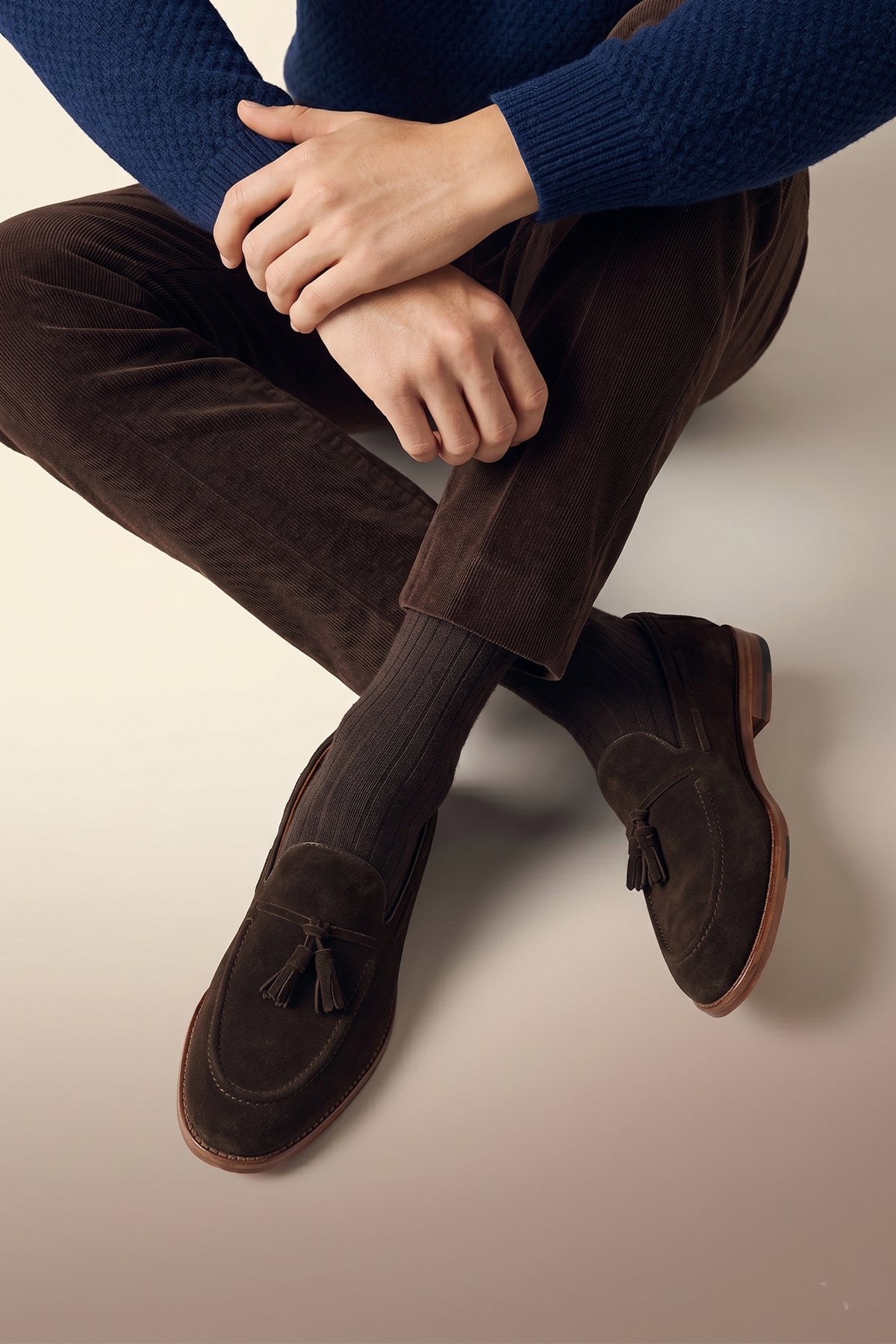 Model wearing Brown suede tassel loafers for men with comfort sole, combining premium suede craftsmanship and modern elegance for stylish everyday wear.