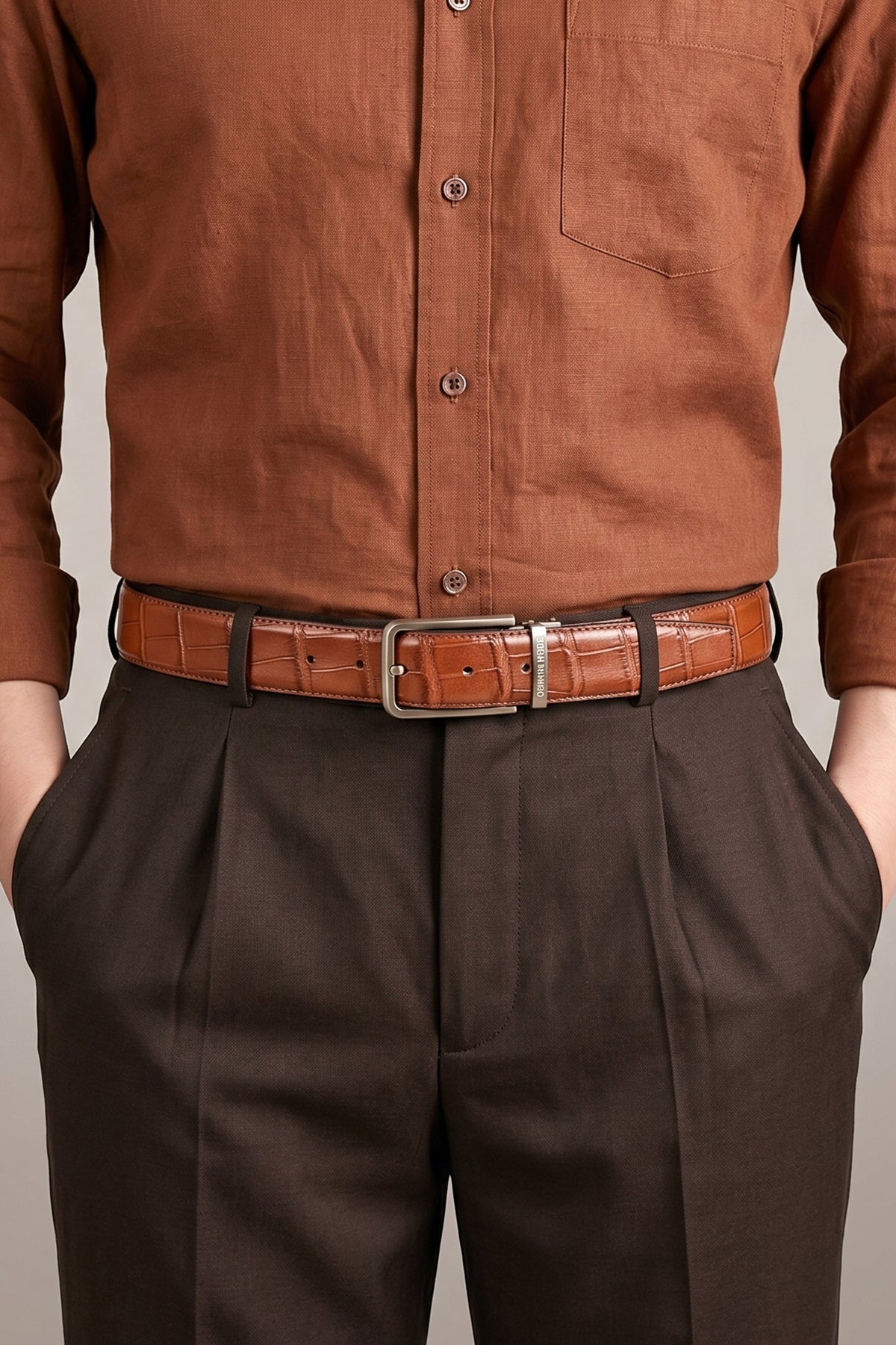 Man wearing Reggie Brown croc effect leather belt for men
