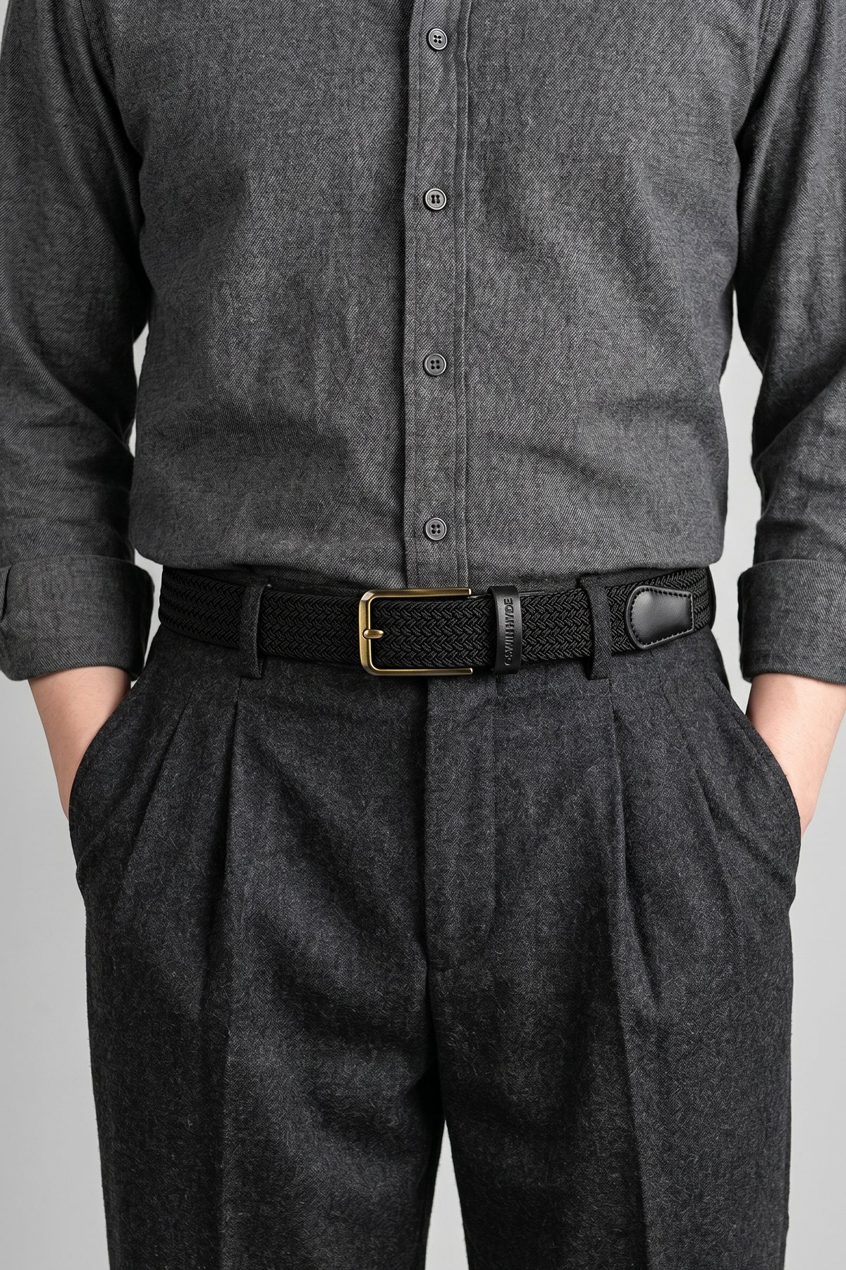 Man wearing Oswin Hyde Aron belt - Black elastic webbing for formal and smart-casual ensembles