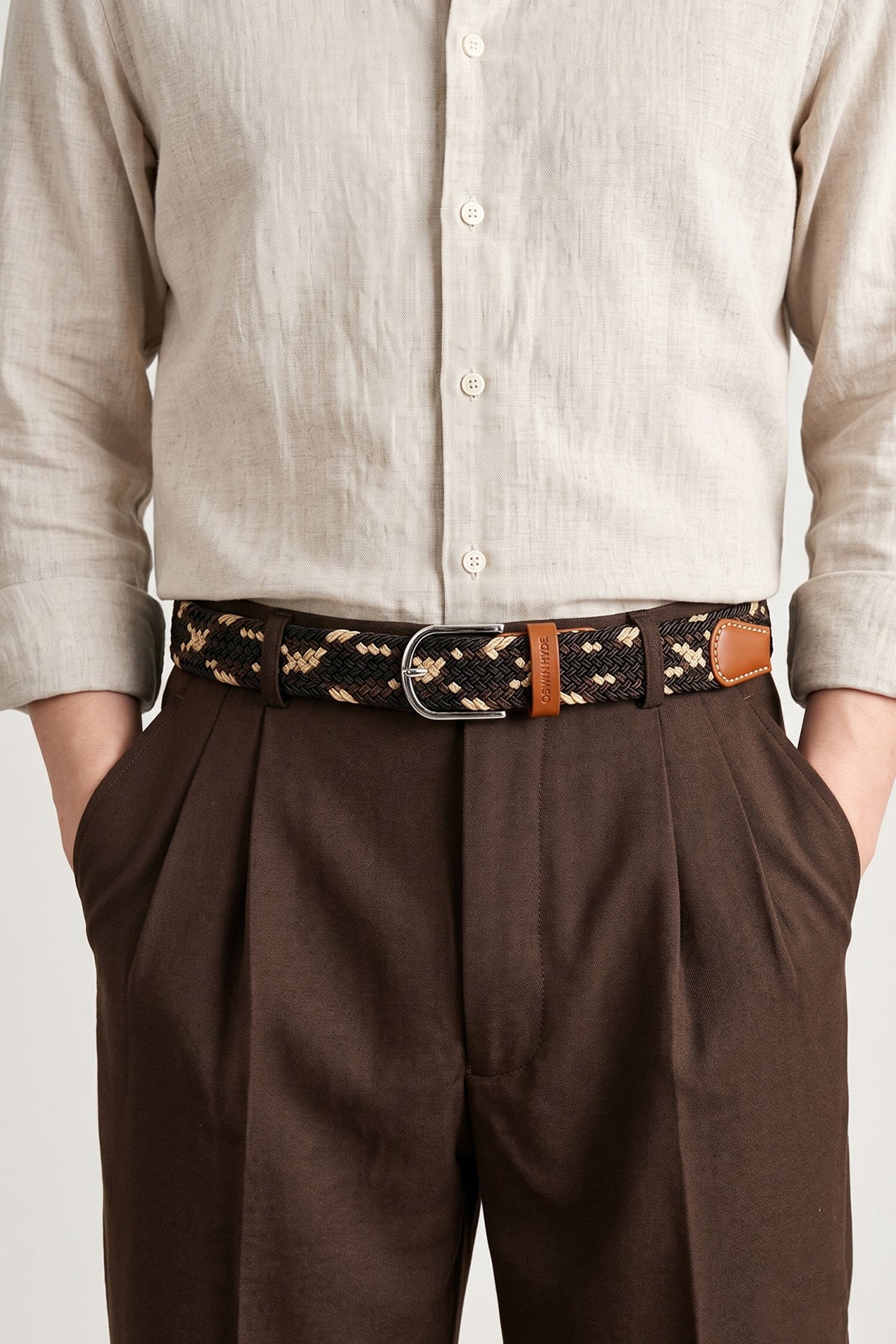 Man wearing Oswin Hyde Guy Tan belt - Braided elastic in tan mix, for smart-casual and everyday wear