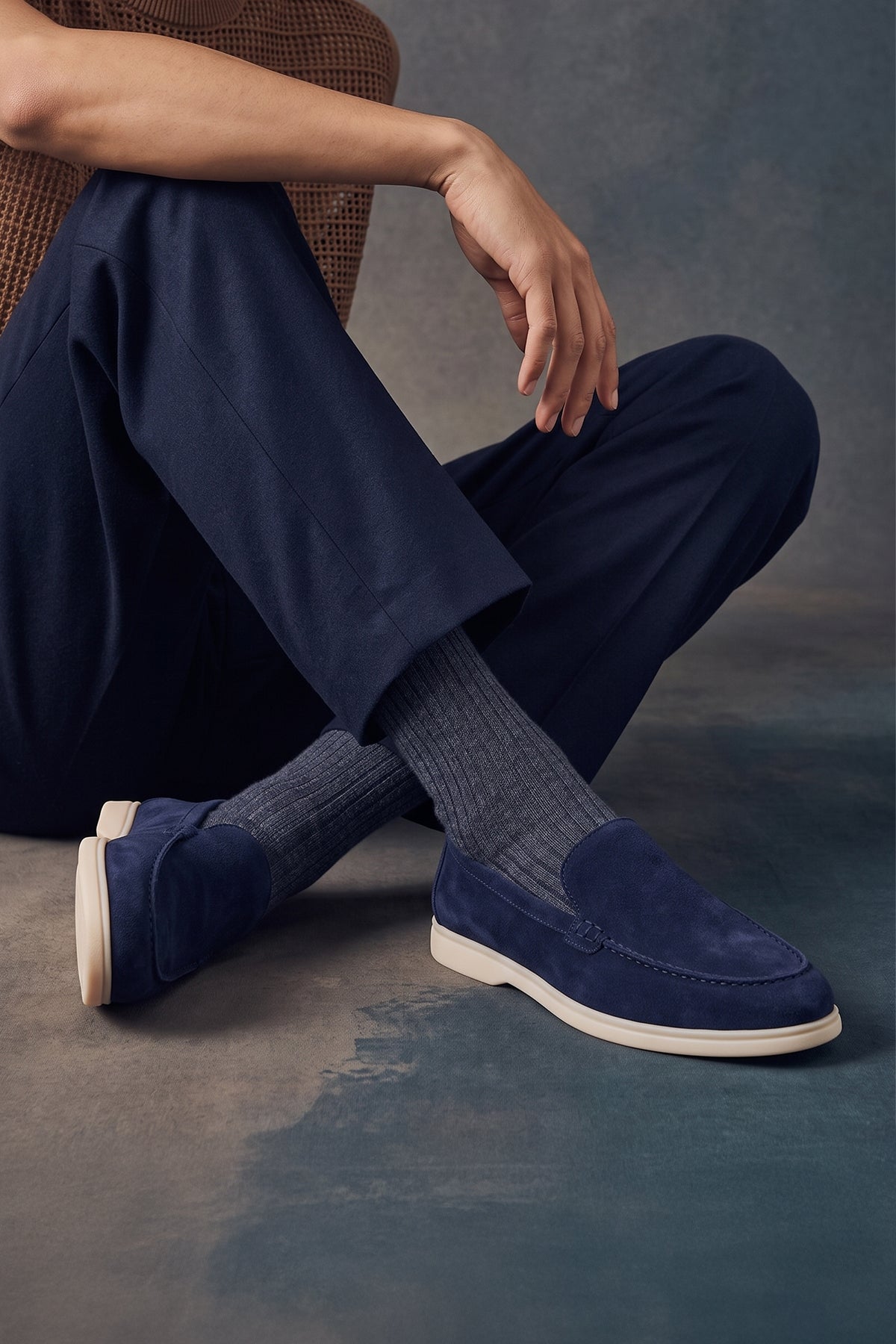Top-down view of Oswin Hyde Morgan Navy suede loafers, highlighting the teal blue inner lining and gold logo branding.